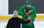 Minnesota Wild left wing Marcus Foligno greeted head coach Dean Evason during a practice. ] ANTHONY SOUFFLE • anthony.souffle@startribune.com