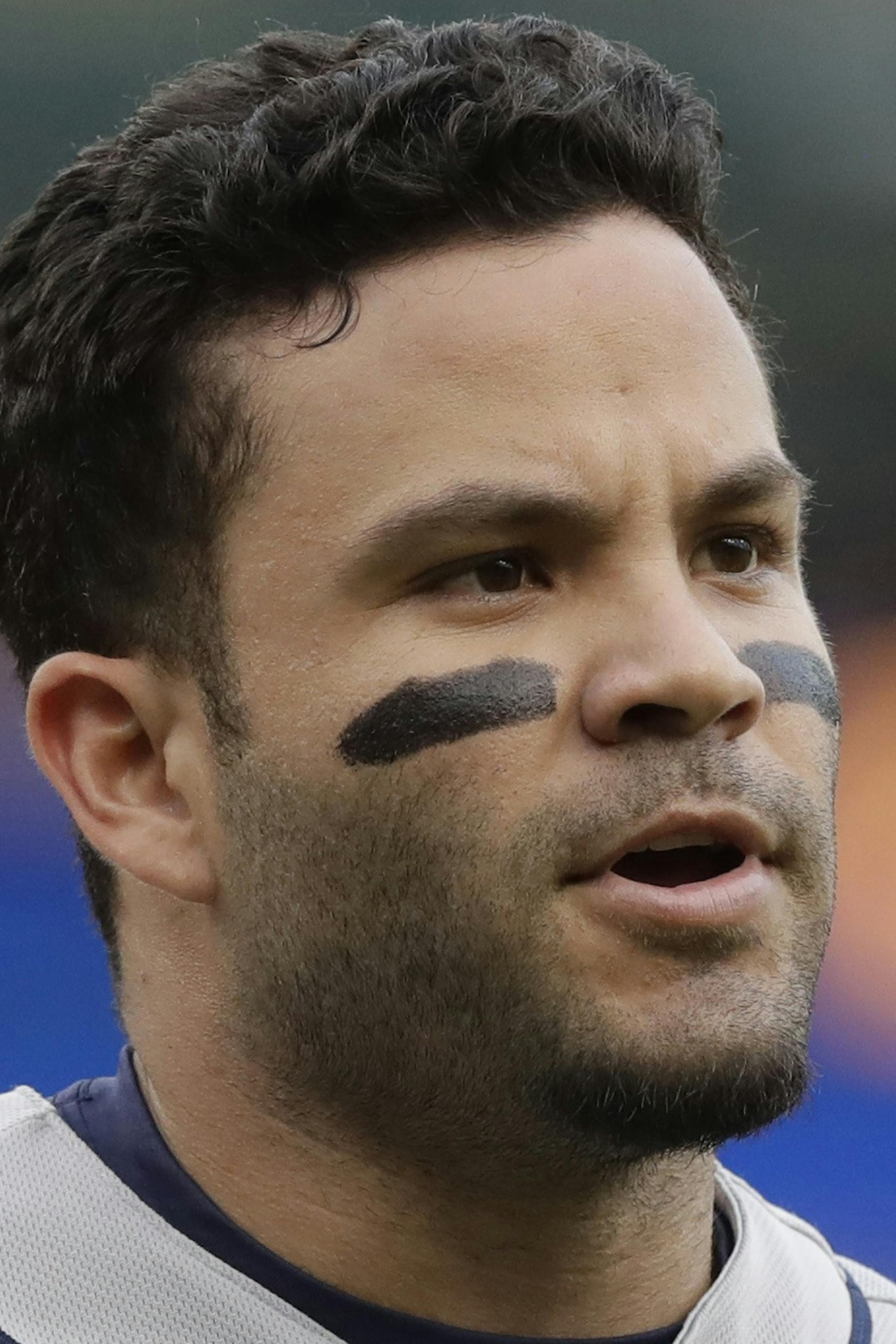Houston Astros' Jose Altuve arrives at the dugout after his two-run home run during the first inning of a baseball game against the Detroit Tigers, Friday, July 29, 2016, in Detroit. (AP Photo/Carlos Osorio)
