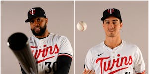 New MLB rules meant that even if Joe Ryan, right, wanted to give newly signed veteran free agent Carlos Santana, left, his jersey number, he couldn't 