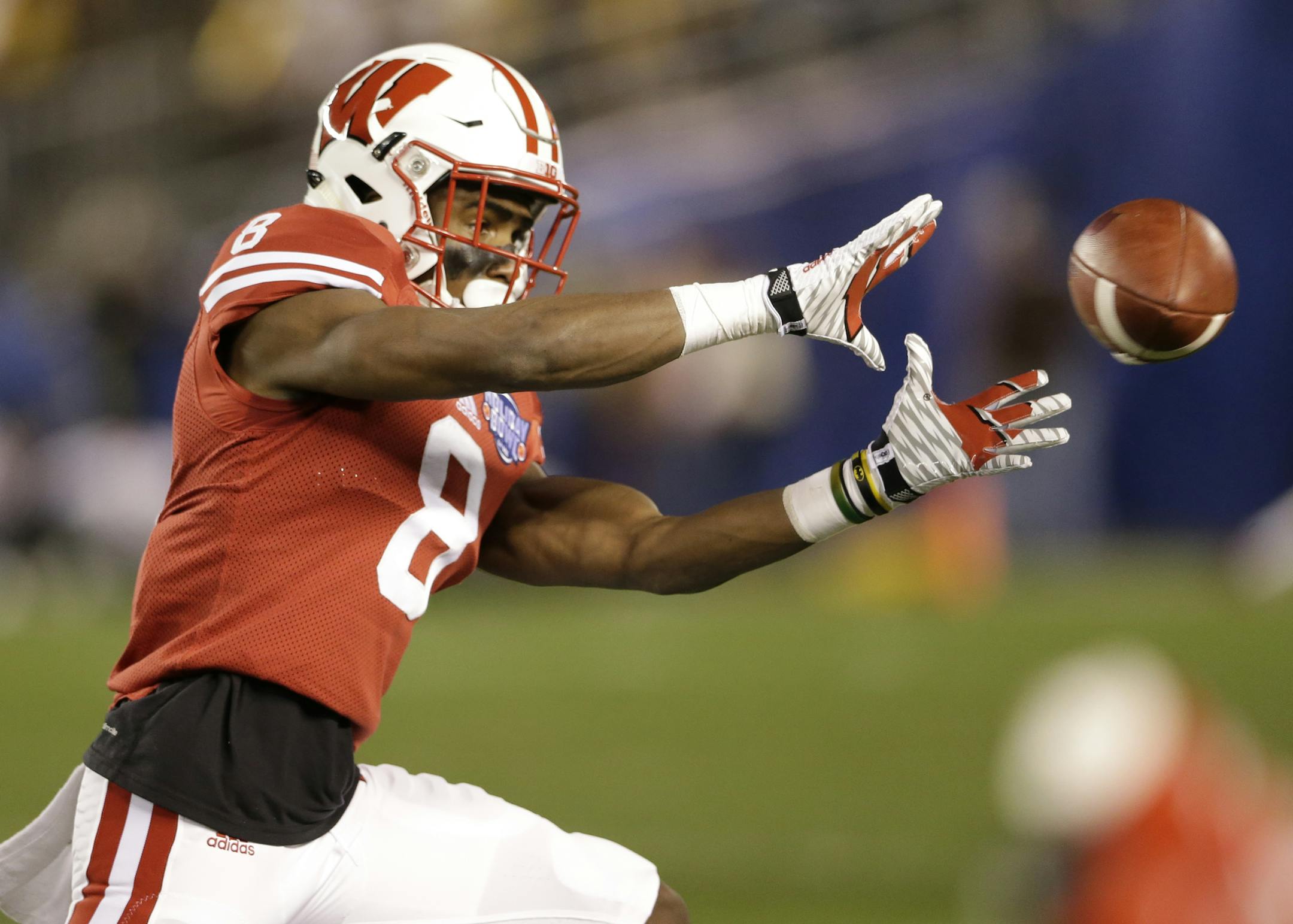 In this Wednesday, Dec. 30, 2015, photo, Wisconsin cornerback Sojourn Shelton warms up before the Holiday Bowl NCAA college football game against Southern California in San Diego. Leaping at Lambeau Field might come at a price for the Wisconsin Badgers. They might be better off staying on the ground on Saturday, Sept. 3, 2016, in the marquee season opener against No. 5 LSU because the celebration could be a penalty in college football. (AP Photo/Gregory Bull)
