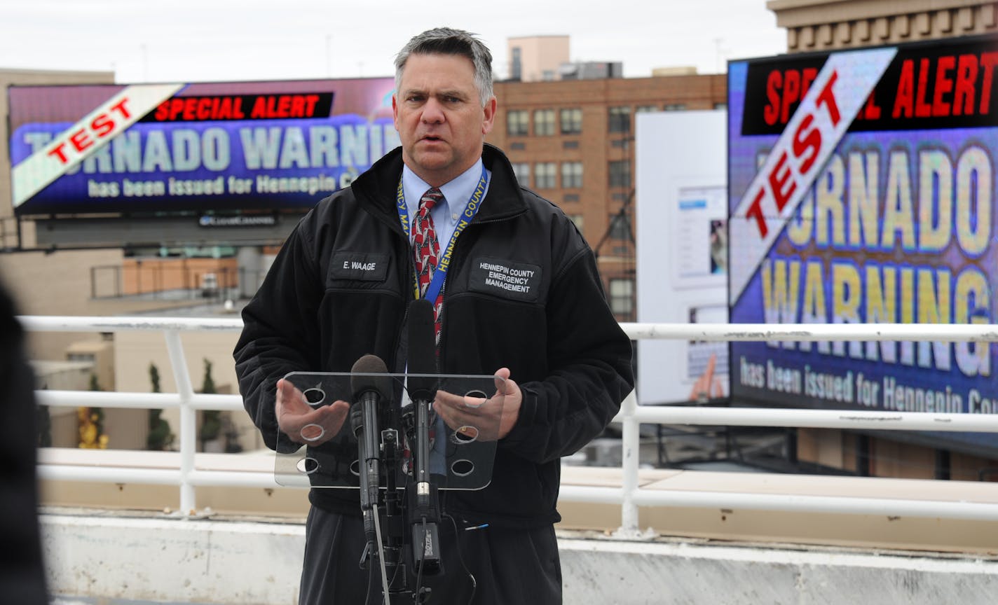 Clear Channel partnering with emergency agencies to have digital billboards post tornado warnings. This was a test, for Severe Weather Awareness Week and the 3 billboards were posted with the tornado warning at 7th and Hennepin Ave. Eric Waage Dir. Hennepin County Emergency Management talked about how the billboards will be used during a tornado warning. Eric Waage Dir. Hennepin County Emergency Management talked about how the billboards will be used during a tornado warning.] Richard.Sennott@startribune.com Richard Sennott/Star Tribune. , Minneapolis, Minn. Tuesday 4/16/13) ** (cq)