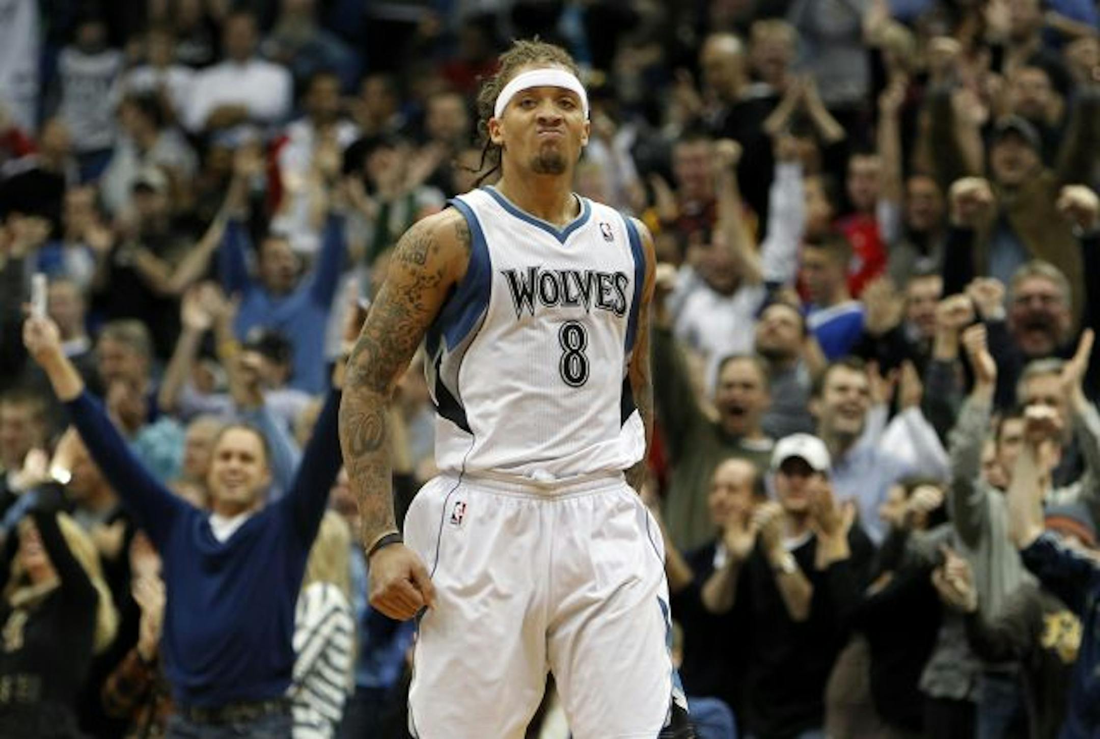 Michael Beasley (8) celebrated after scoring in the final seconds of the game to give the Timberwolves the lead and the win. Minnesota beat Los Angeles by a final score of 113-111. Beasley had 33 points in the game.