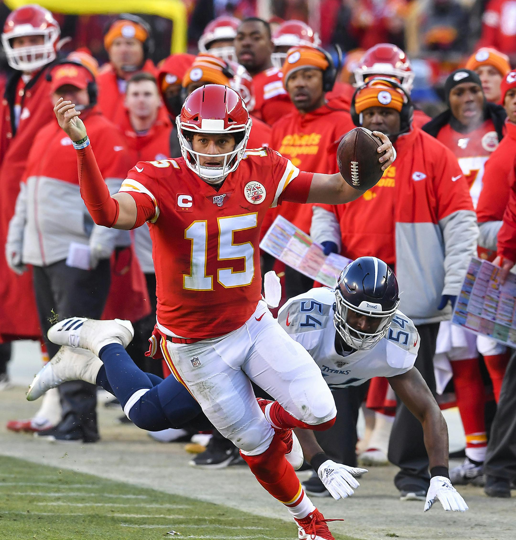Kansas City Chiefs quarterback Patrick Mahomes works to say in bounds on a 27-yard touchdown run late in the second quarter against the Tennessee Titans during the AFC championship game on Sunday, Jan. 19, 2020, at Arrowhead Stadium in Kansas City, Mo. (Rich Sugg/Kansas City Star/TNS) ORG XMIT: 1546756