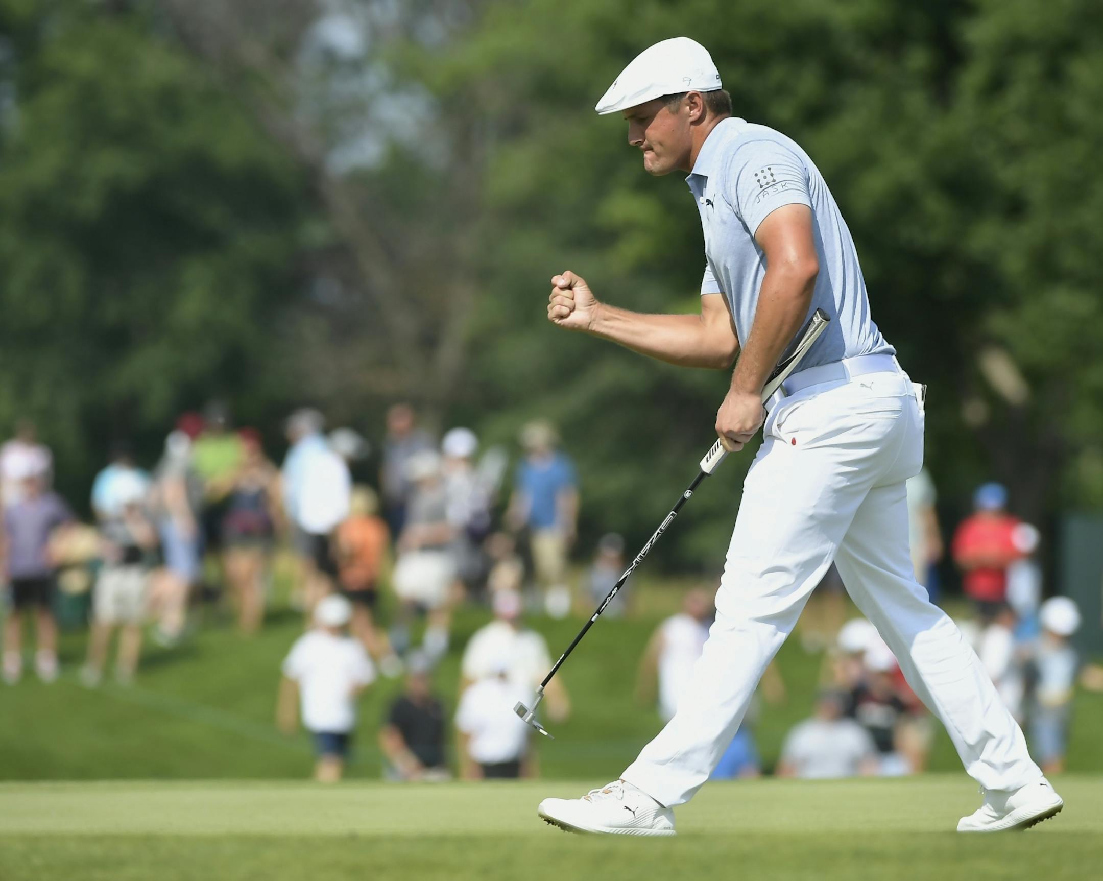 Bryson DeChambeau celebrated after making a birdie on the 16th hole during the 3M Open at TPC Twin Cities.
