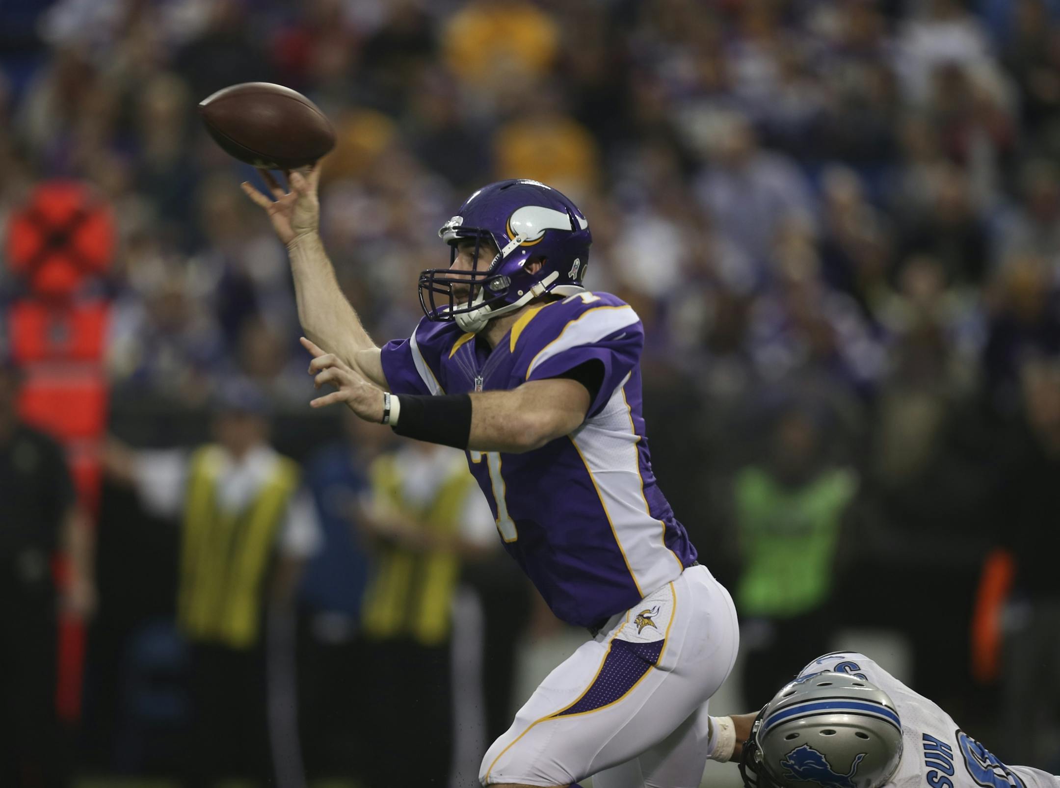 Vikings quarterback Christian Ponder got a second-quarter pass off under pressure from the Lions' Ndamukong Suh.