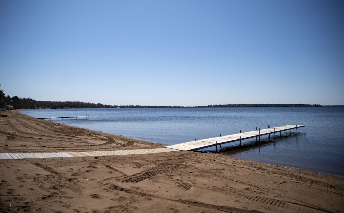 The beach on Gull Lake at Grand View Lodge sat empty on Monday. "It's really hard to see," Resort Manager Kevin Karau said.