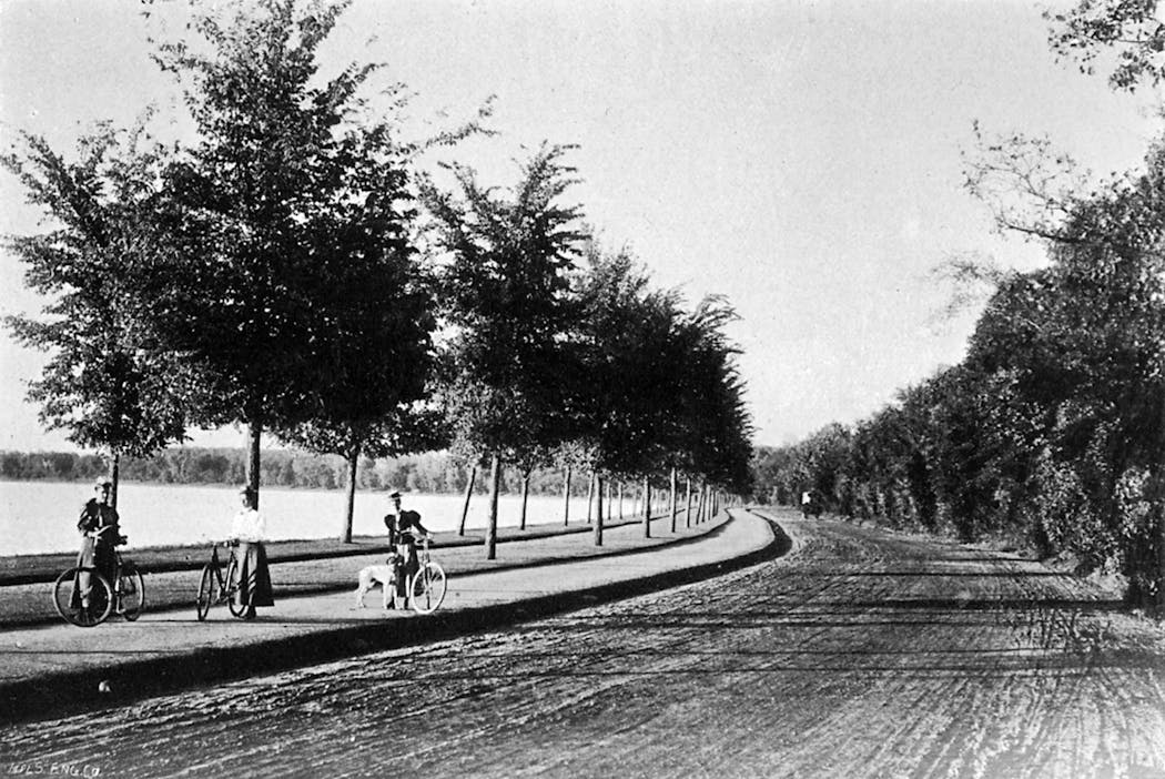 Bicyclists on a Lake Harriet bike path in the 1890s.