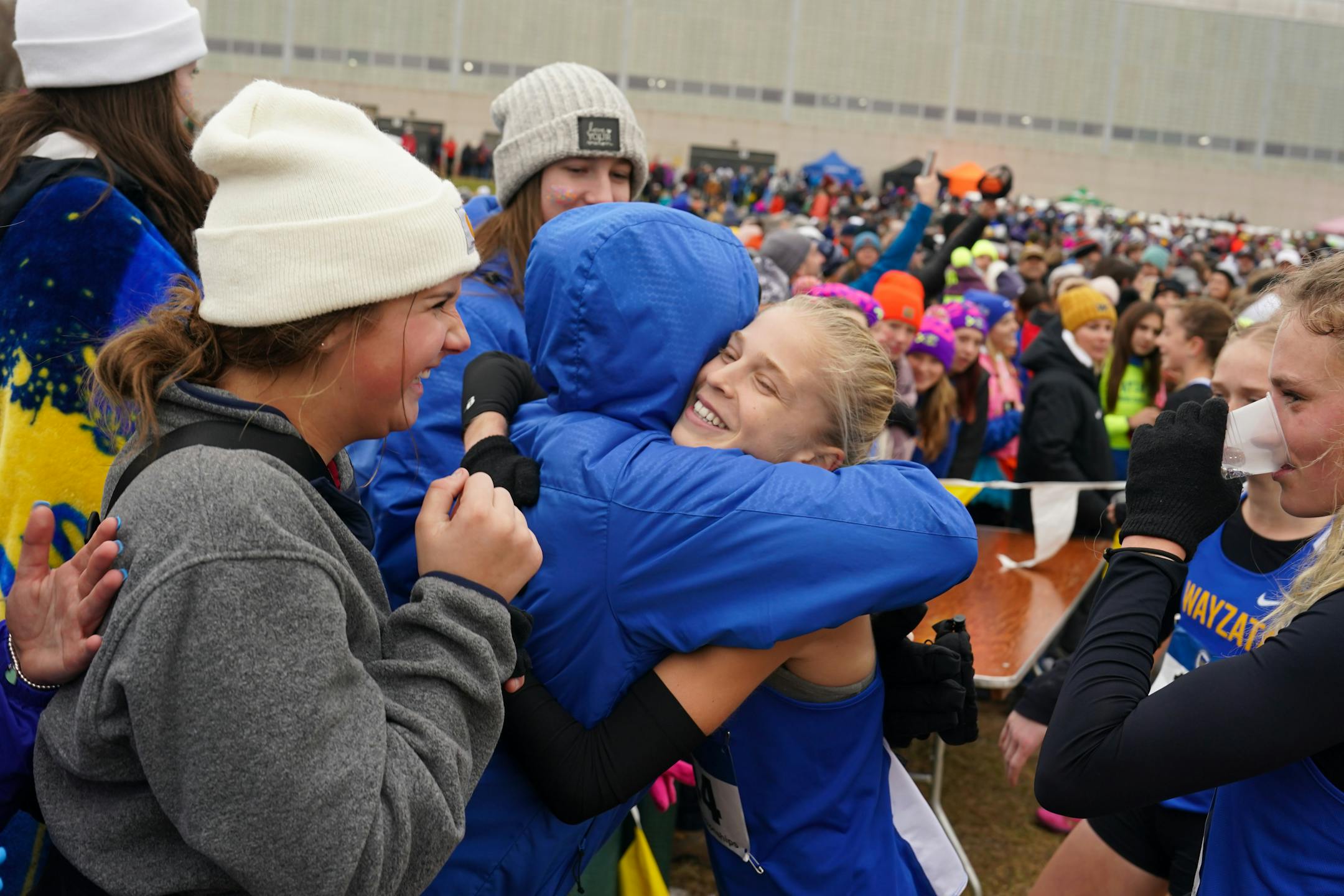 Abbey Nechanicky greets friends and supporters after winning the race.