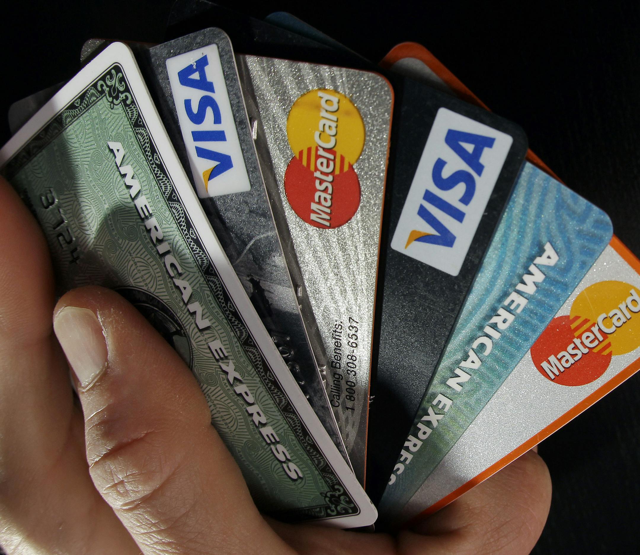 FILE - In this March 5, 2012, file photo, consumer credit cards are posed in North Andover, Mass. Today&#xed;s competitive credit card market has turned lucrative for consumers, meaning what would have been a good offer just a few years ago no longer measures up. (AP Photo/Elise Amendola, File)