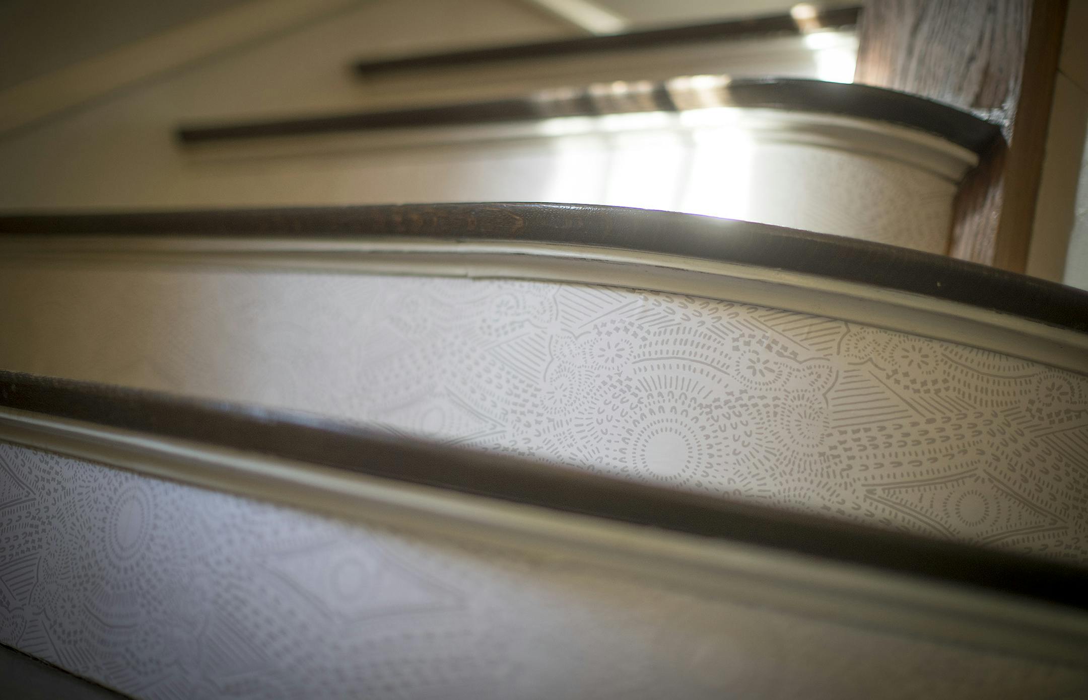 Aimee Lagos runs her wallpaper company known as Hygge & West from her Cedar Lake 1908 foursquare. She has decorated it with eclectic furnishings, artwork and her popular wallpaper. Photographed Thursday, September 21, 2017 in Minneapolis, MN. ] ELIZABETH FLORES • liz.flores@startribune.com