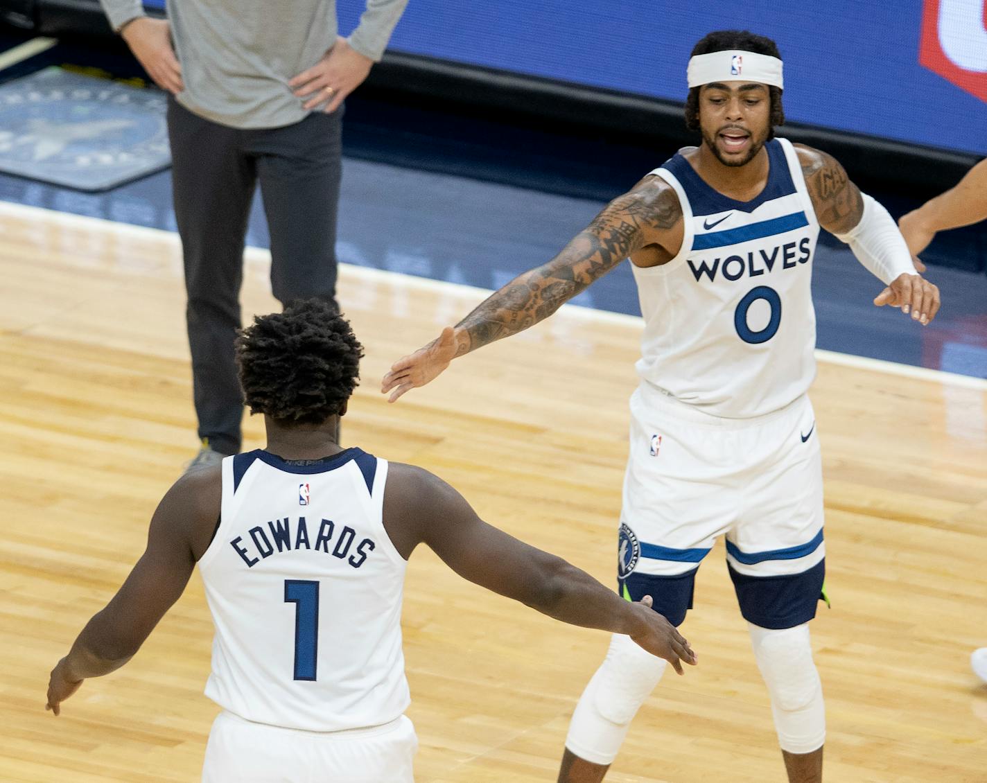 Timberwolves rookie Anthony Edwards (1) and D'Angelo Russell (0).