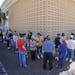 South Florida voters line up to vote at the John F. Kennedy Library in Hialeah, Fla., Saturday, Oct. 27, 2012. Special polling places opened throughou