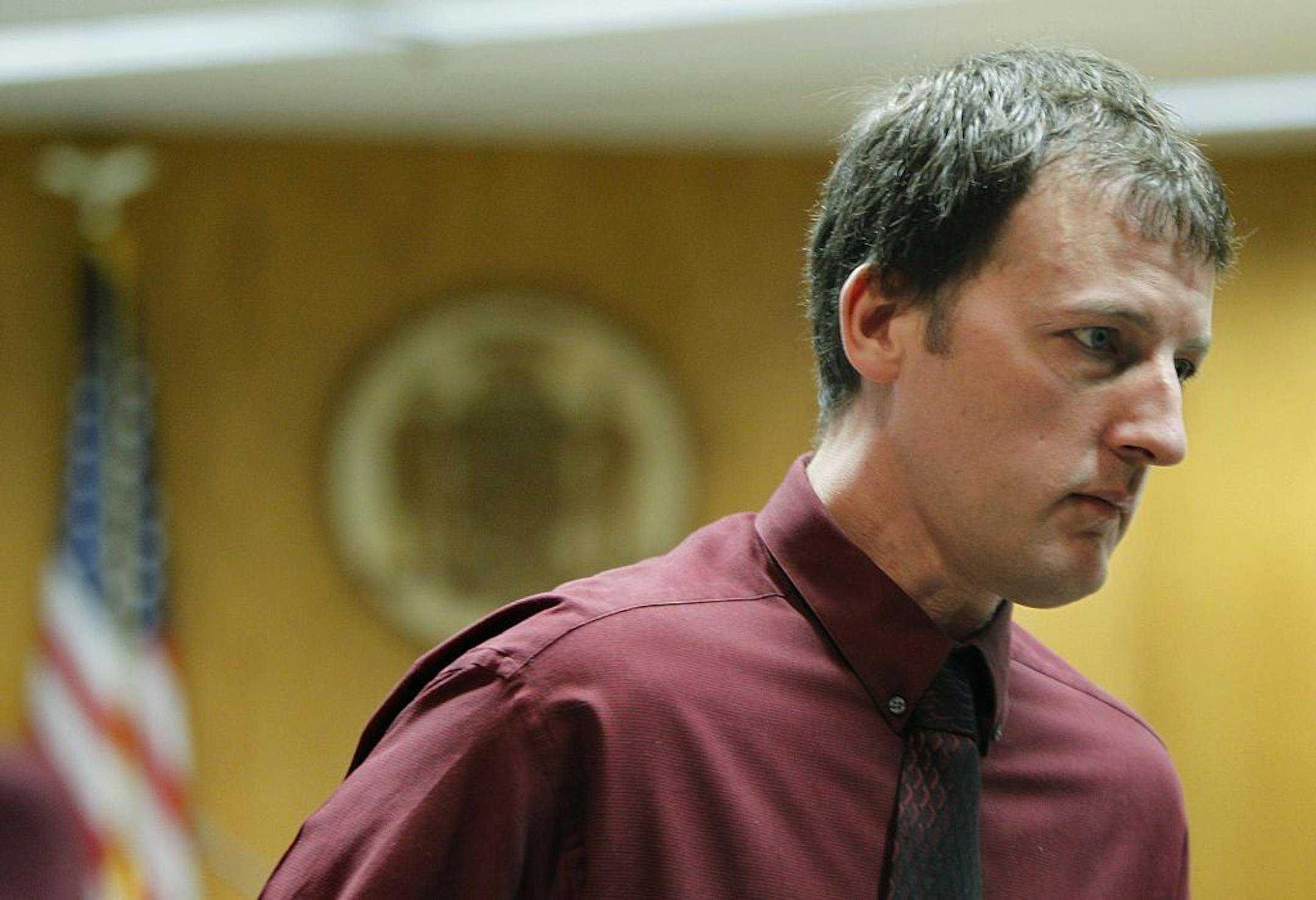 Aaron Schaffhausen made his way out of the courtroom after testimony from the prosecution's witness during the 10th day of trial at a St. Croix County Courtroom in Hudson, Wis., Monday, April 15, 2013
