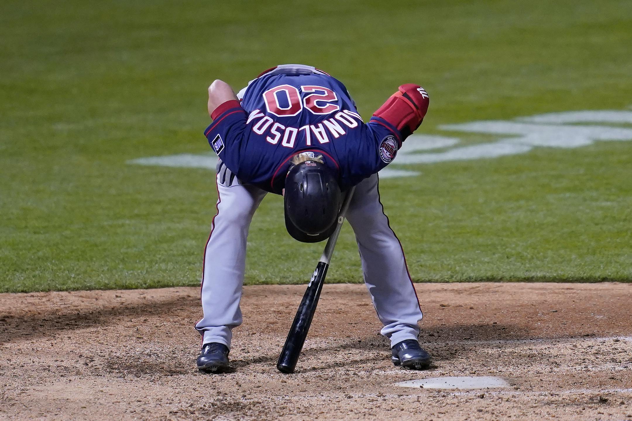 Minnesota Twins' Josh Donaldson reacts after striking out against the Oakland Athletics during the sixth inning of the second baseball game of a doubleheader in Oakland, Calif., Tuesday, April 20, 2021. (AP Photo/Jeff Chiu)