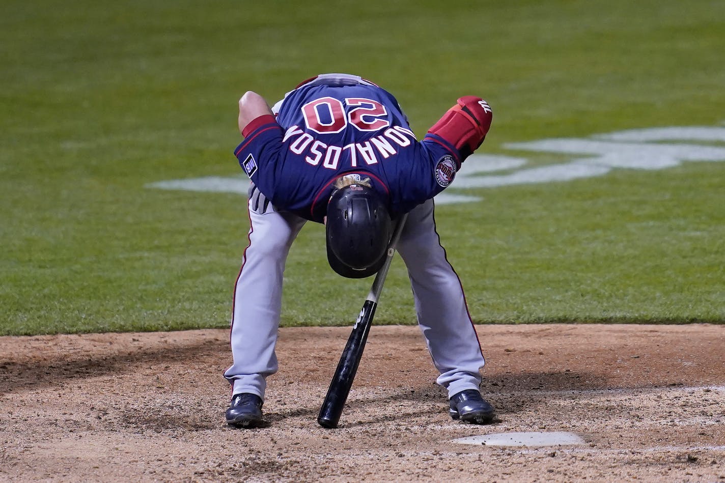 Minnesota Twins' Josh Donaldson reacts after striking out against the Oakland Athletics during the sixth inning of the second baseball game of a doubleheader in Oakland, Calif., Tuesday, April 20, 2021. (AP Photo/Jeff Chiu)