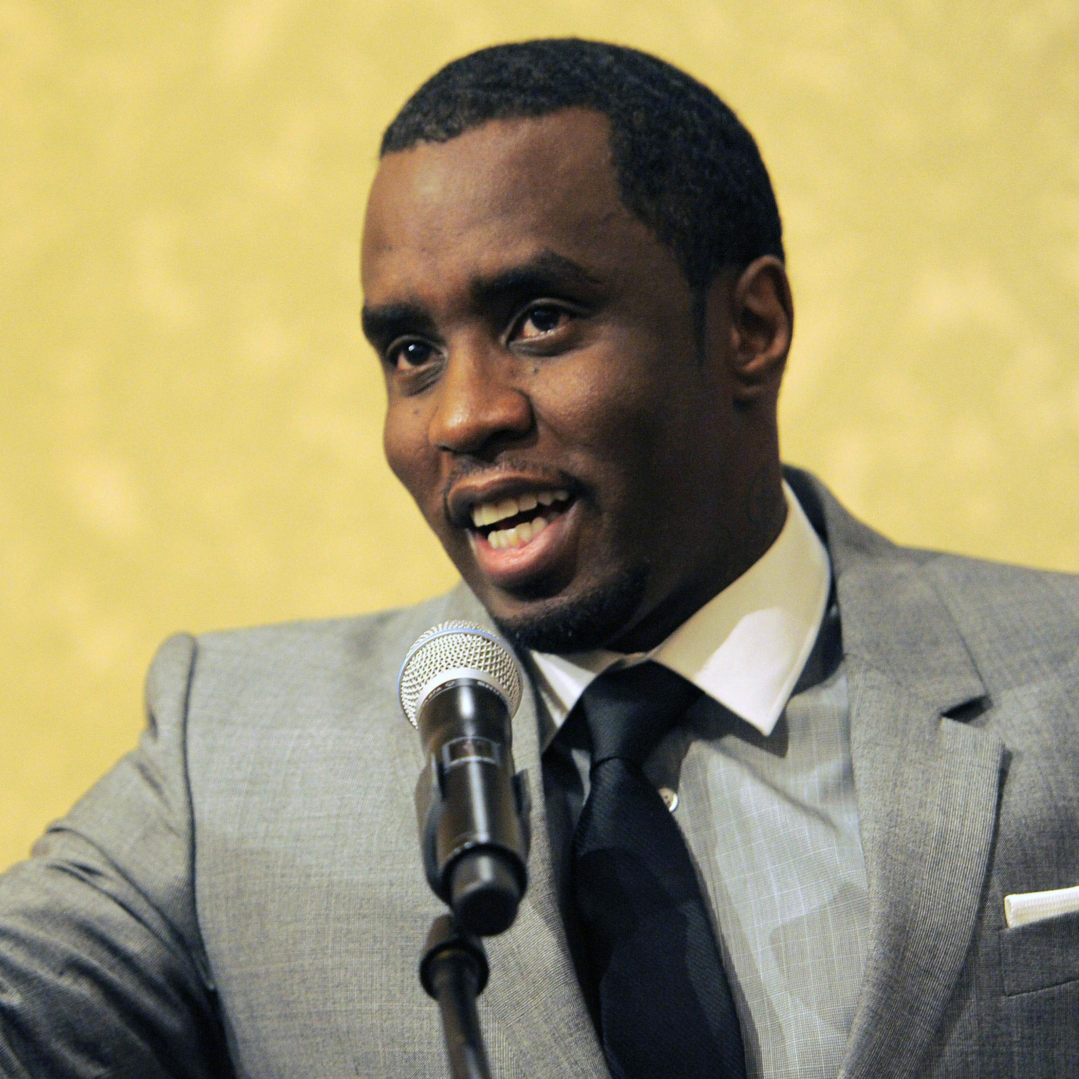 FILE - In this July 26, 2013, file photo, Sean "Diddy" Combs of Revolt TV waits to take the stage for a news conference about the new channel during the Television Critics Association summer press tour at the Beverly Hilton Hotel, in Beverly Hills, Calif. Already a success in music and fashion, Combs has big dreams for television, too, wanting to build a network that will be seen as the ESPN of music. (Photo by Chris Pizzello/Invision/AP, File)