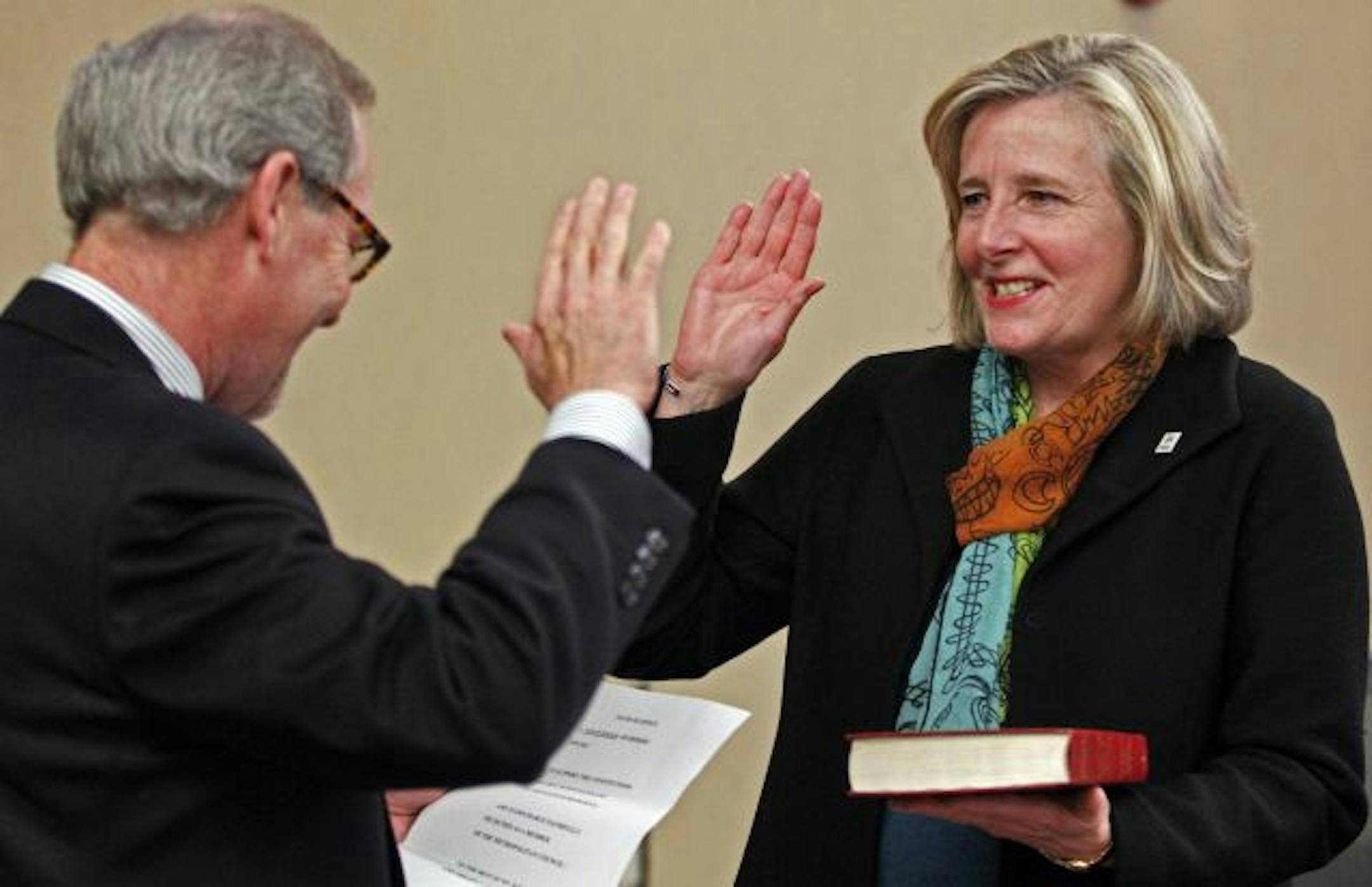 Susan Haigh was sworn in this month as the new chairwoman of the Metropolitan Council. Conducting the swearing-in was her husband, Gregg Johnson, who is a Ramsey County district judge. Haigh plans to keep her full-time job at Habitat for Humanity, as well.