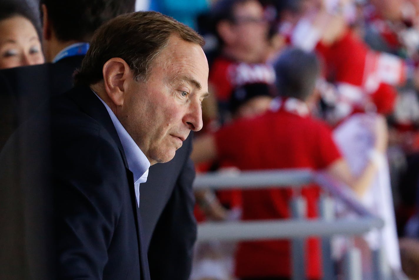 NHL Commissioner Gary Bettman watches the game between Sweden and Canada in the gold medal men's ice hockey game at the 2014 Winter Olympics, Sunday, Feb. 23, 2014, in Sochi, Russia. (AP Photo/Mark Humphrey) ORG XMIT: OLYMH204