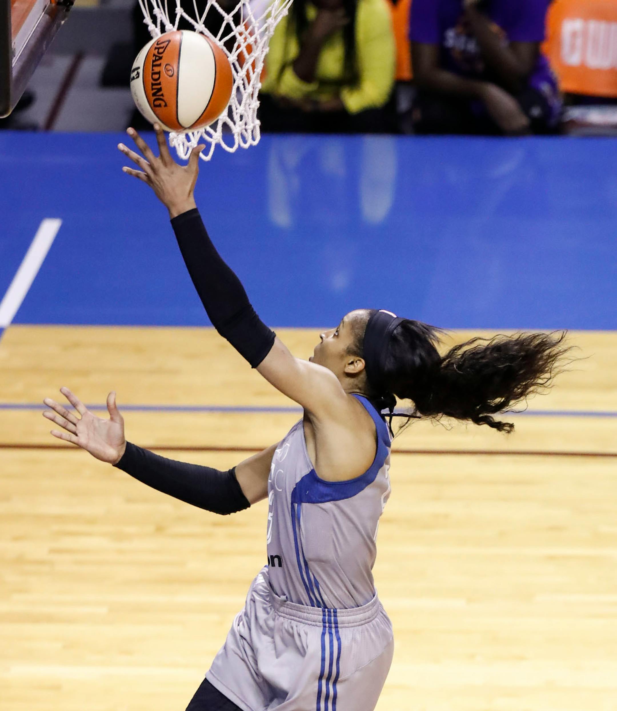Minnesota Lynx forward Maya Moore (23) went for a shot during the first half.