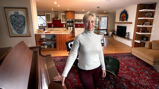 The refreshed and redesigned interiors of a 1958 split-level, including zebrawood cabinet doors and accents, is “bright, open and comfortable,” said homeowner Dorene Wernke. The renovation was designed by Bob Ganser, who was principal in charge at CityDeskStudio at the time.