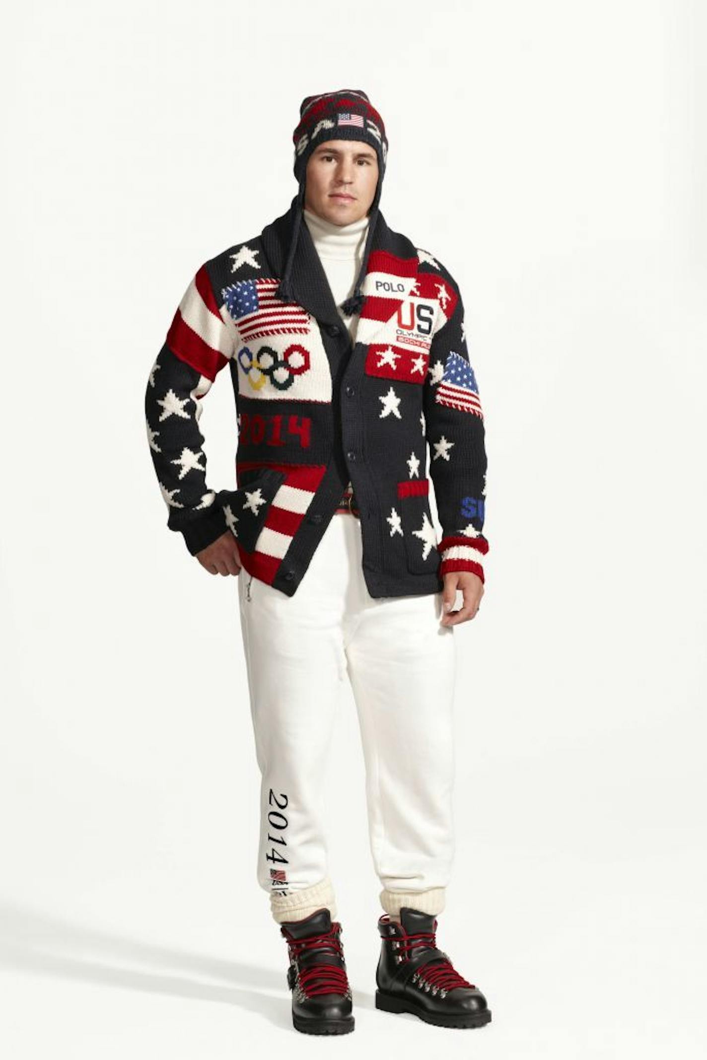 This product image released by Ralph Lauren shows American hockey player Zach Parise wearing the official uniform for Team USA to be worn at the opening ceremony for the 2014 Winter Olympic games in Sochi, Russia. Every article of clothing made by Ralph Lauren for the U.S. Winter Olympic athletes in Sochi, including their opening and closing ceremony uniforms and their Olympic Village gear, has been made by domestic craftsman and manufacturers.