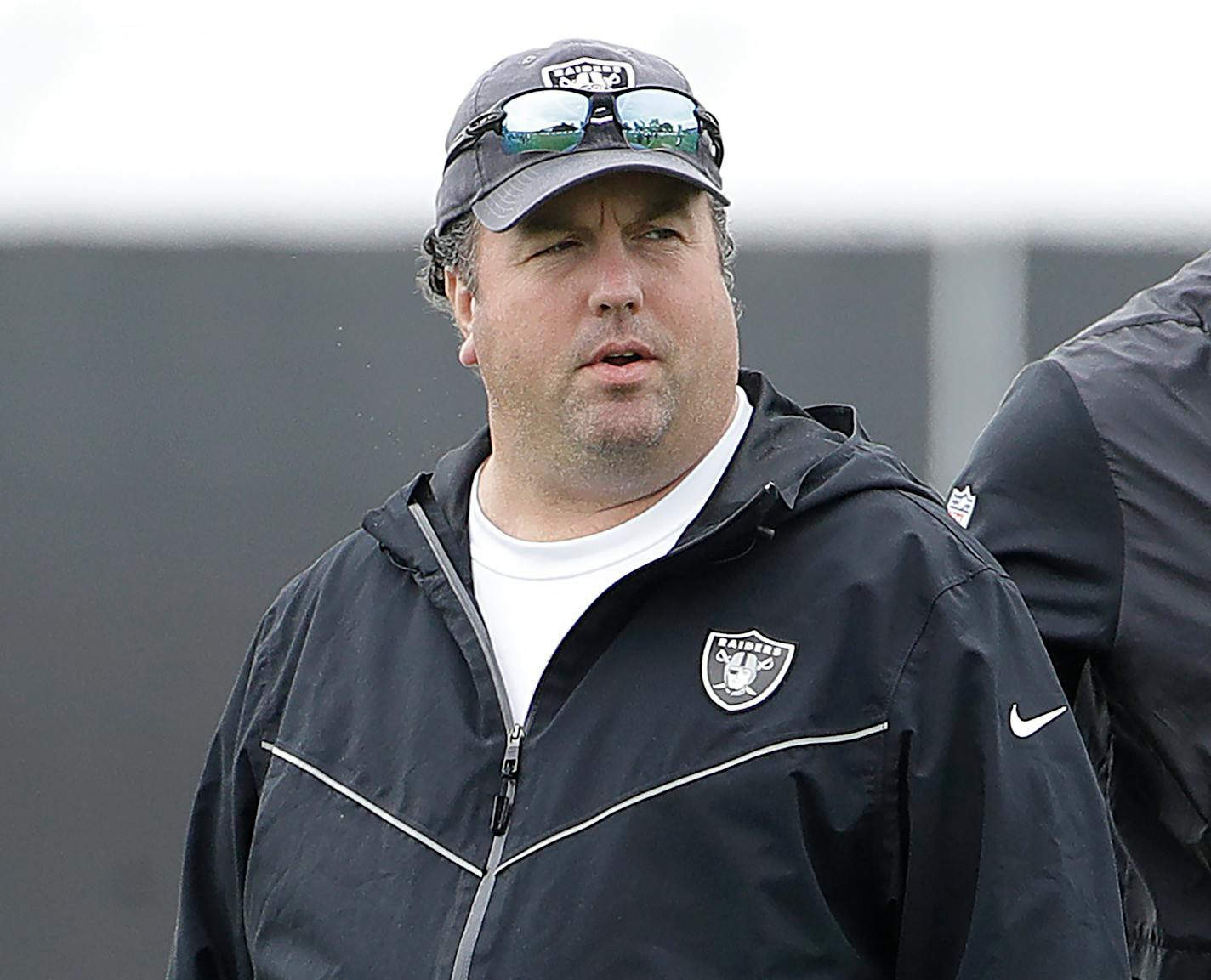 FILE - In this April 11, 2019, file photo, Oakland Raiders defensive coordinator Paul Guenther attends an NFL local Pro Day at the team's football facility in Alameda, Calif. The Las Vegas Raiders fired Guenther after he failed to make any significant improvement for the unit in nearly three full seasons on the job. (AP Photo/Jeff Chiu, File)