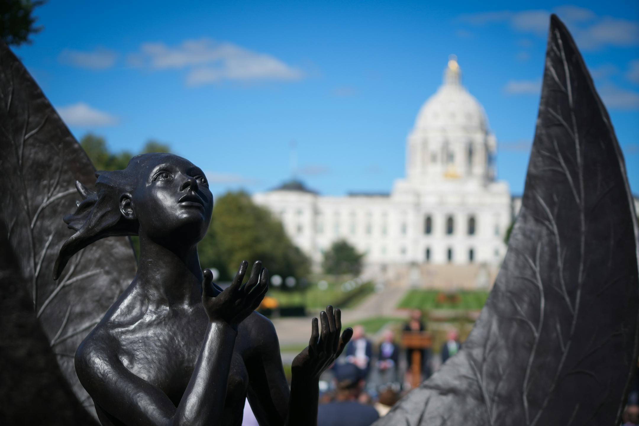 The Minnesota Medial of Honor Memorial, built around the existing "Promise of Youth" sculpture, was unveiled during a dedication Thursday on the State Capitol grounds in St. Paul.