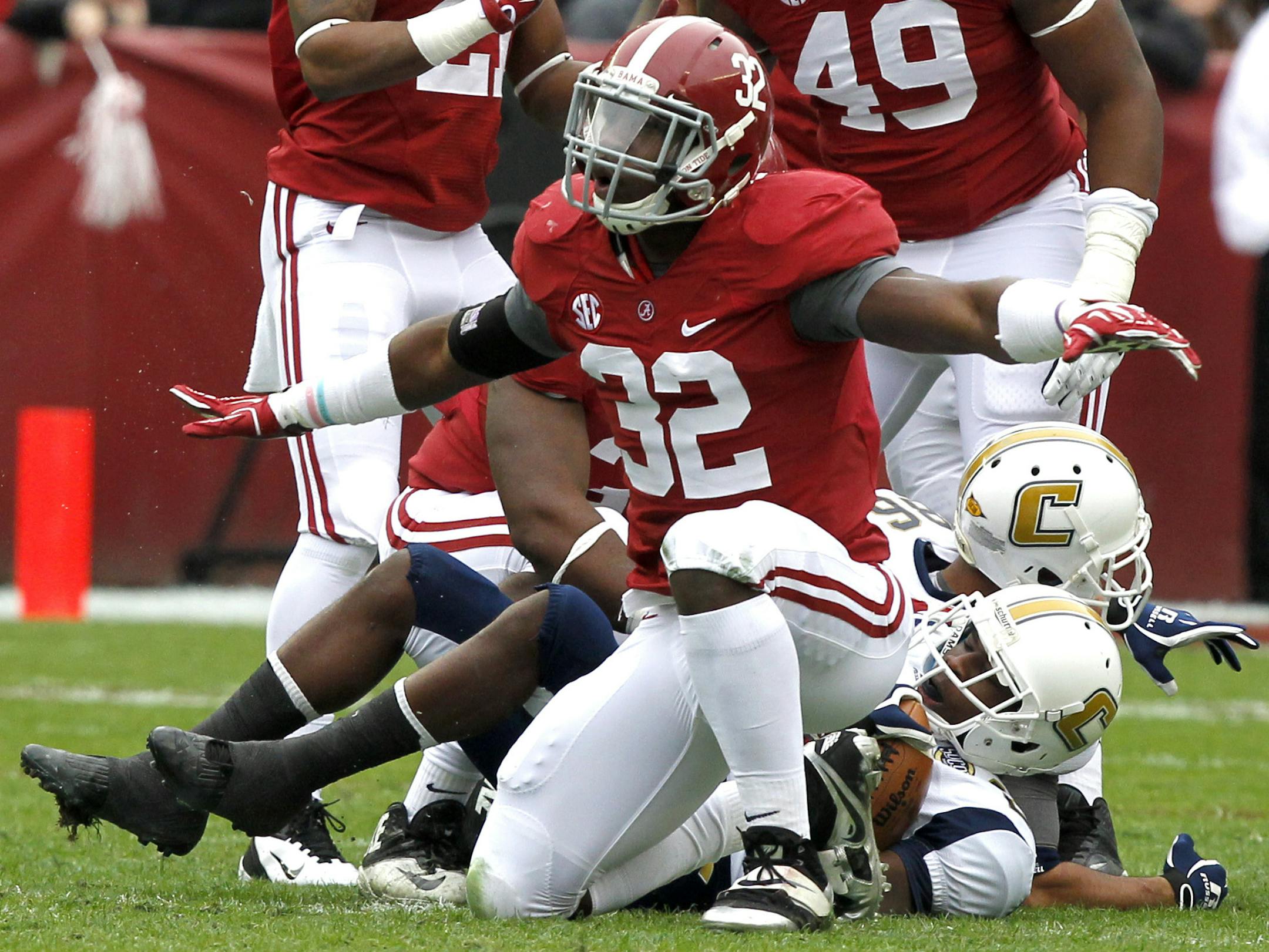 Alabama linebacker C.J. Mosley (32) celebrates after a tackle to stop Chattanooga during the first half of an NCAA college football game on Saturday, Nov. 23, 2012, in Tuscaloosa, Ala. (AP Photo/Butch Dill) ORG XMIT: NYOTK