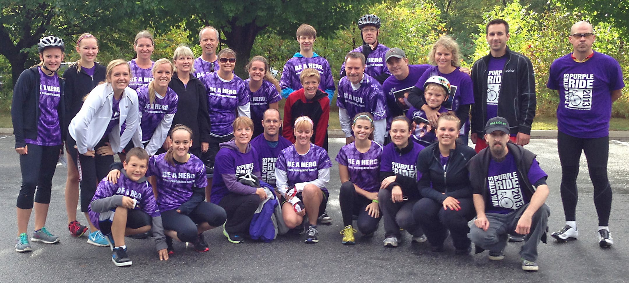 Doolittles-Porter Creek restaurants co-owner John Sheehan, (fourth from left in back row) a cancer survivor who hopes he&#x201a;&#xc4;&#xf4;s become a more empathetic employer, joined 29 employees and friends on &#x201a;&#xc4;&#xfa;Team Make a Difference&#x201a;&#xc4;&#xf9; who were part of the 1,200 bicyclists who raised a record $430,000 for the Pancreatic Cancer Action Network at Purple Ride Twin Cities on Sept. 15 at the Elm Creek Park in Maple Grove. Photo: Courtesy of John Sheehan