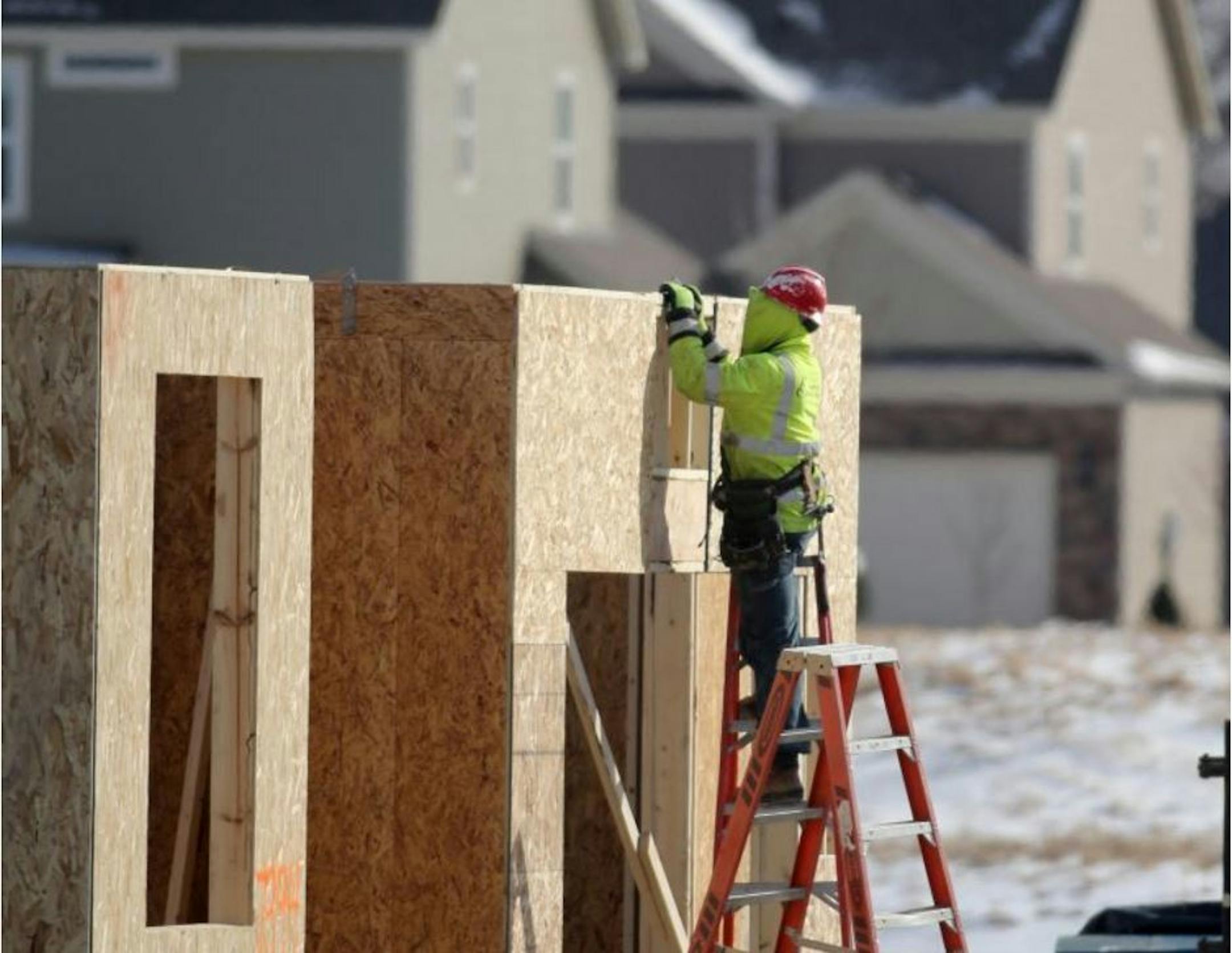 The Twin Cities is the 16th-most undersupplied housing market in the nation, according to a new report. For every 7.9 jobs created in the metro area, only one house was built from 2013 through 2015. Here, a carpenter works on a home under construction in Maple Grove in February 2015.