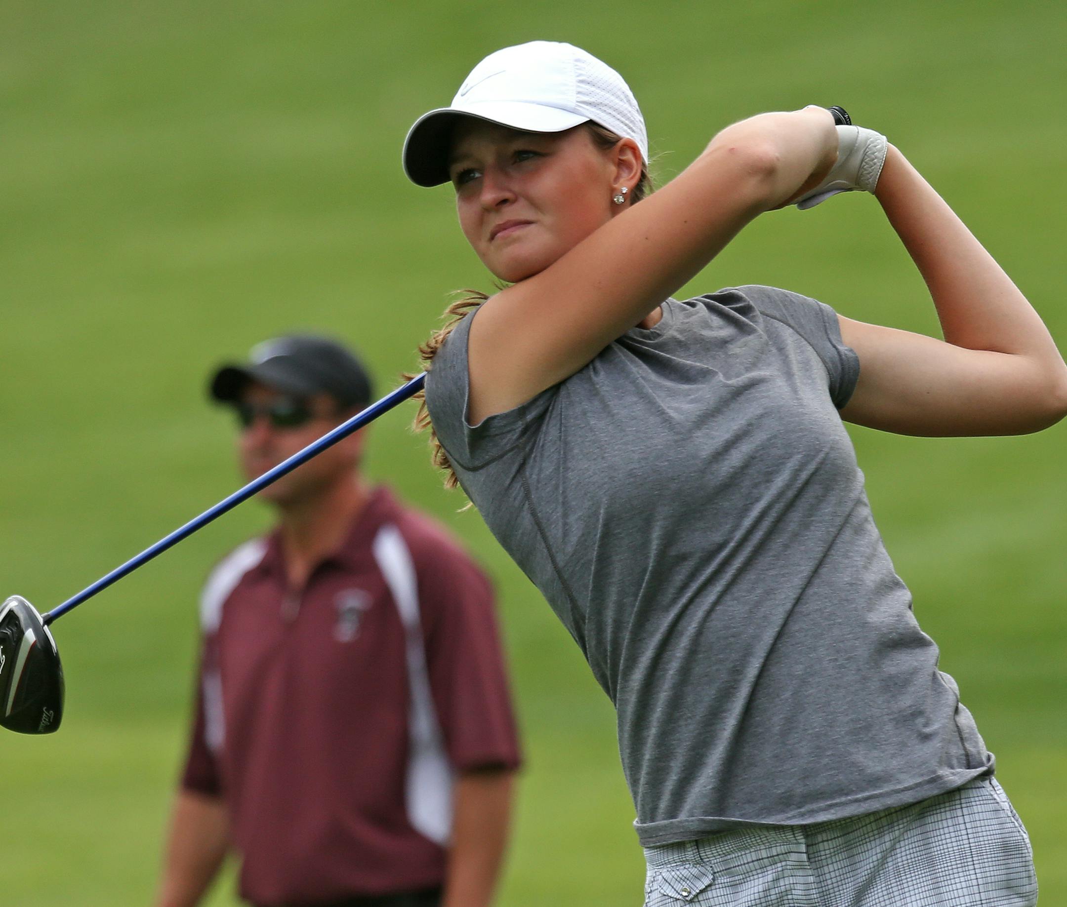 New Pragues's Kenzie Neisen hit the ball from the 4th hole tee on the west course, during the second day of the Girls Class AAA Golf Tournament, Bunker Hills Golf Course, Coon Rapids MN.] Bruce Bisping/Star Tribune bbisping@startribune.com Kenzie Neisen/roster.