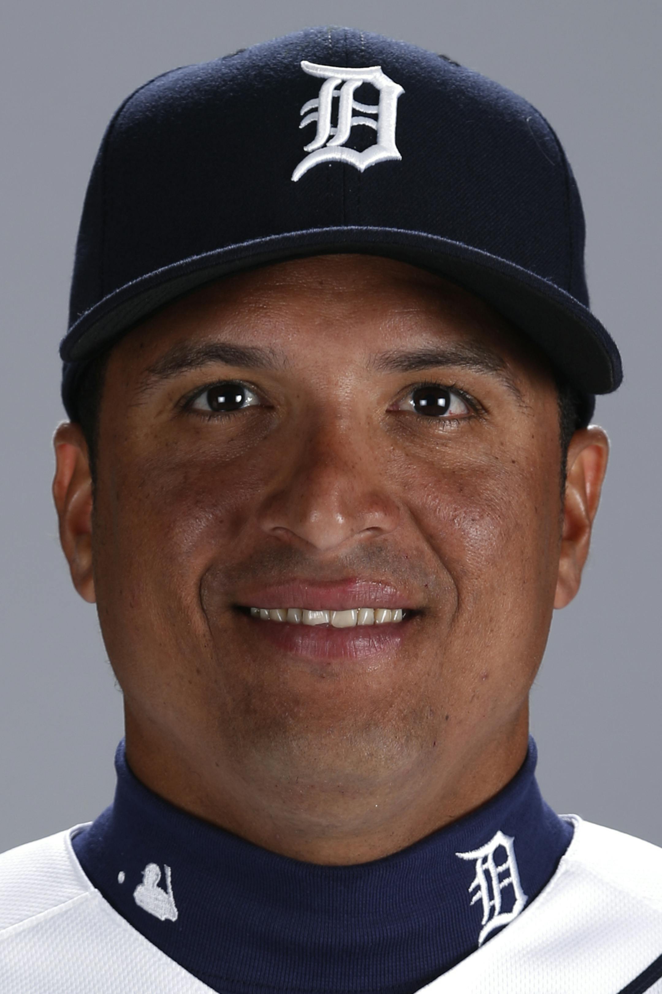 This is a 2014 photo of Victor Martinez of the Detroit Tigers baseball team. This image reflects the Tigers active roster as of Sunday, Feb. 23, 2014 when this image was taken at spring training in Lakeland, Fla. (AP Photo/Gene J. Puskar) ORG XMIT: FLGP