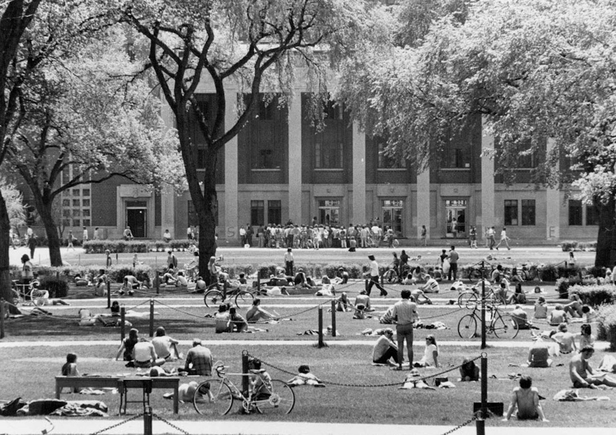 Students sat on Northrop Mall in May, 1972, as a small antiwar protest took place in front of Corrman Union (rear of photo). The Mall's original plan called for a sloping parkland going down to the river, but Coffman cut that off. ORG XMIT: MIN1508261908310370