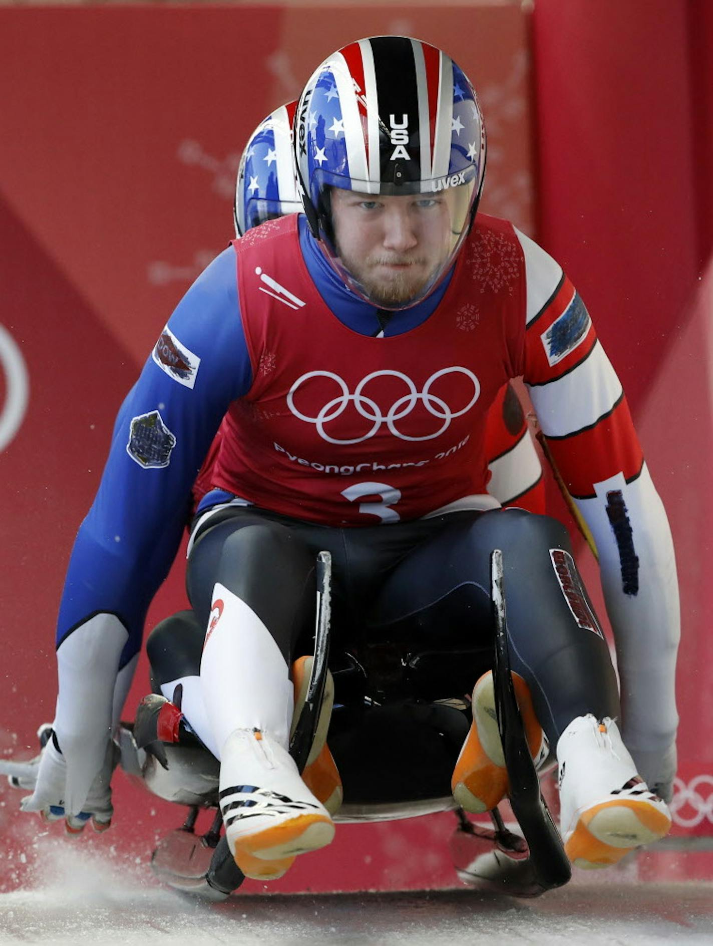 Justin Krewson and Andrew Sherk of the United States start their run during the doubles luge training at the 2018 Winter Olympics in Pyeongchang, South Korea, Monday, Feb. 12, 2018. (AP Photo/Andy Wong)