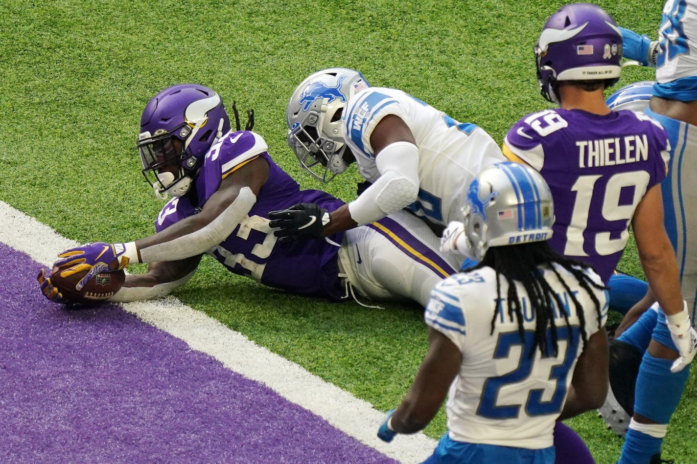 Minnesota Vikings running back Dalvin Cook (33) dove into the end zone for a touchdown in the first quarter. ] ANTHONY SOUFFLE • anthony.souffle@startribune.com The Minnesota Vikings played the Detroit Lions, sans fans to comply with state protocols meant to help slow the spread of COVID-19, Sunday, Nov. 8, 2020 at U.S. Bank Stadium in Minneapolis.