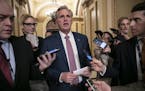 House Majority Leader Kevin McCarthy, R-Calif., left the chamber after the House approved funding for President Donald Trump's border wall Thursday ni