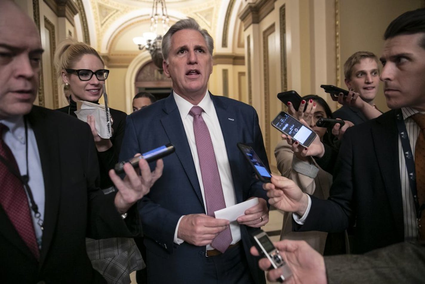 House Majority Leader Kevin McCarthy, R-Calif., left the chamber after the House approved funding for President Donald Trump's border wall Thursday night.