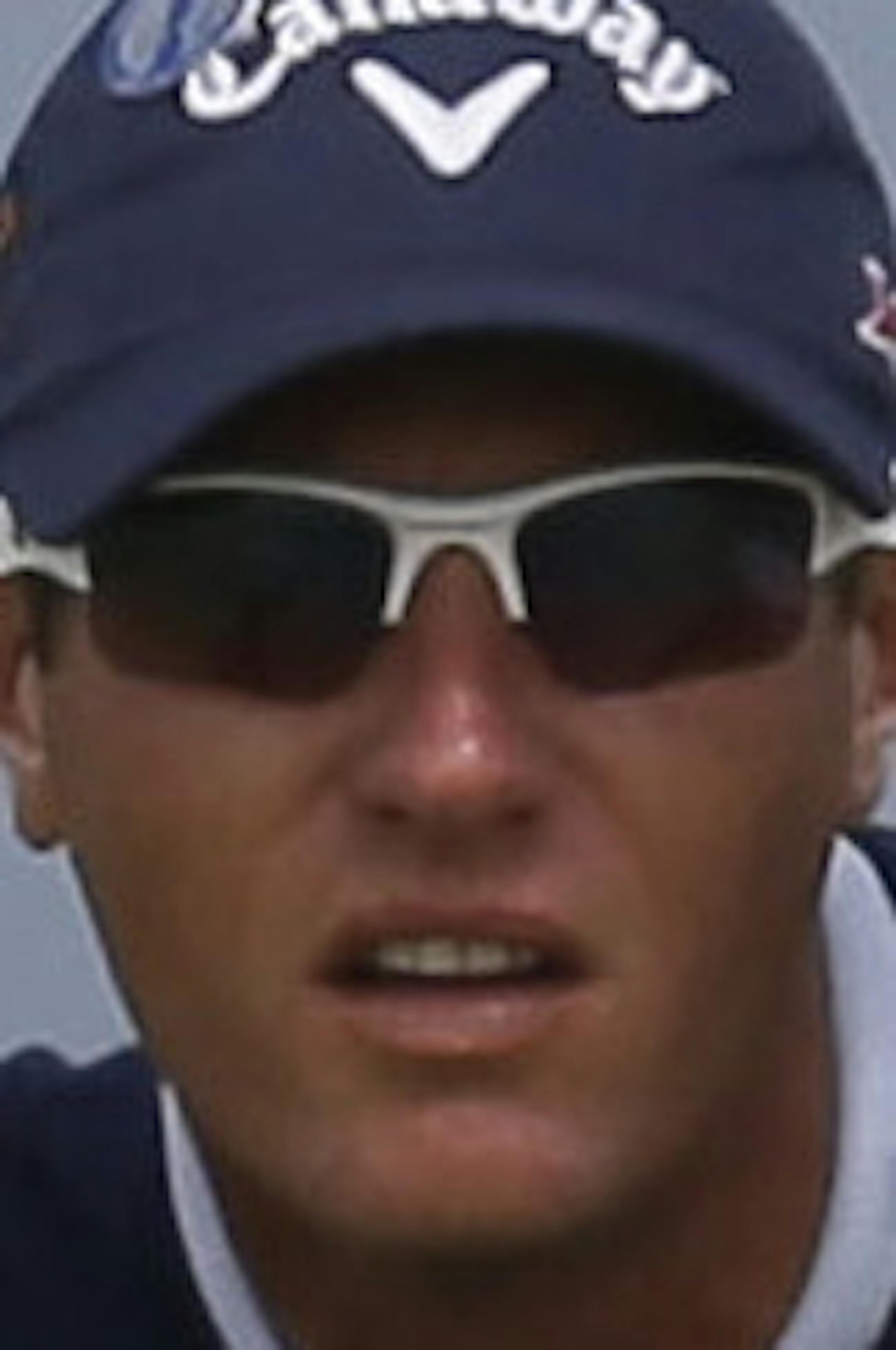Nicolas Colsaerts of Belgium lines up a putt on the 11th green during the first round of the British Open Golf Championship at Muirfield, Scotland, Thursday July 18, 2013. (AP Photo/Jon Super)