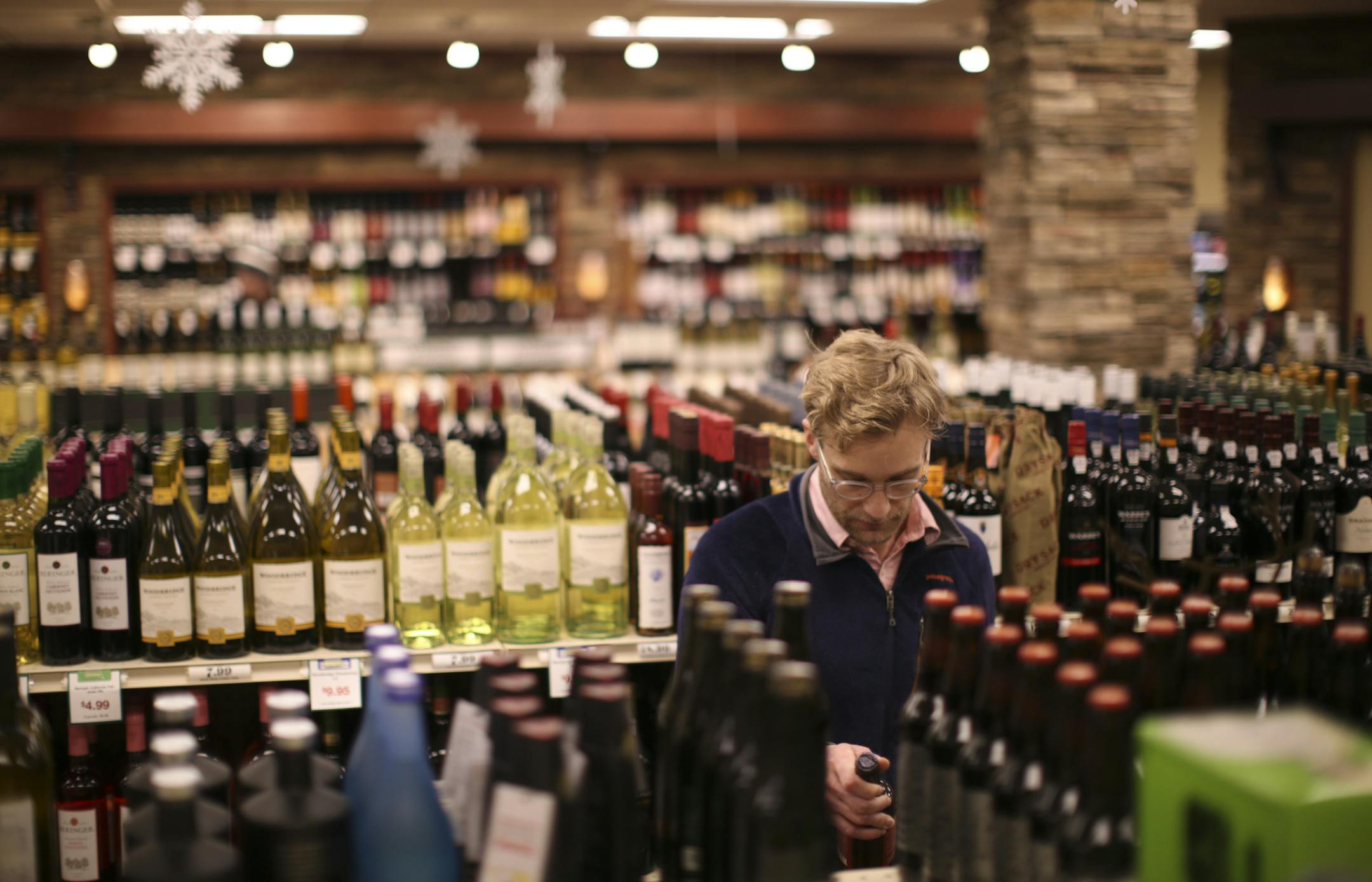Jesse Martin picked up some beer for New Year's Eve in the Edina Liquor store at 50th & France Wednesday afternoon. ] JEFF WHEELER ‚Ä¢ jeff.wheeler@startribune.com The coming year could prove to be a test of municipal liquor's ability to hold its own against an increasingly crowded field of competitors. The city-owned Edina Liquor store at 50th & France recently underwent a $300,000 remodel - one of the things muni liquor stores are doing to hold their own in an increasingly cro