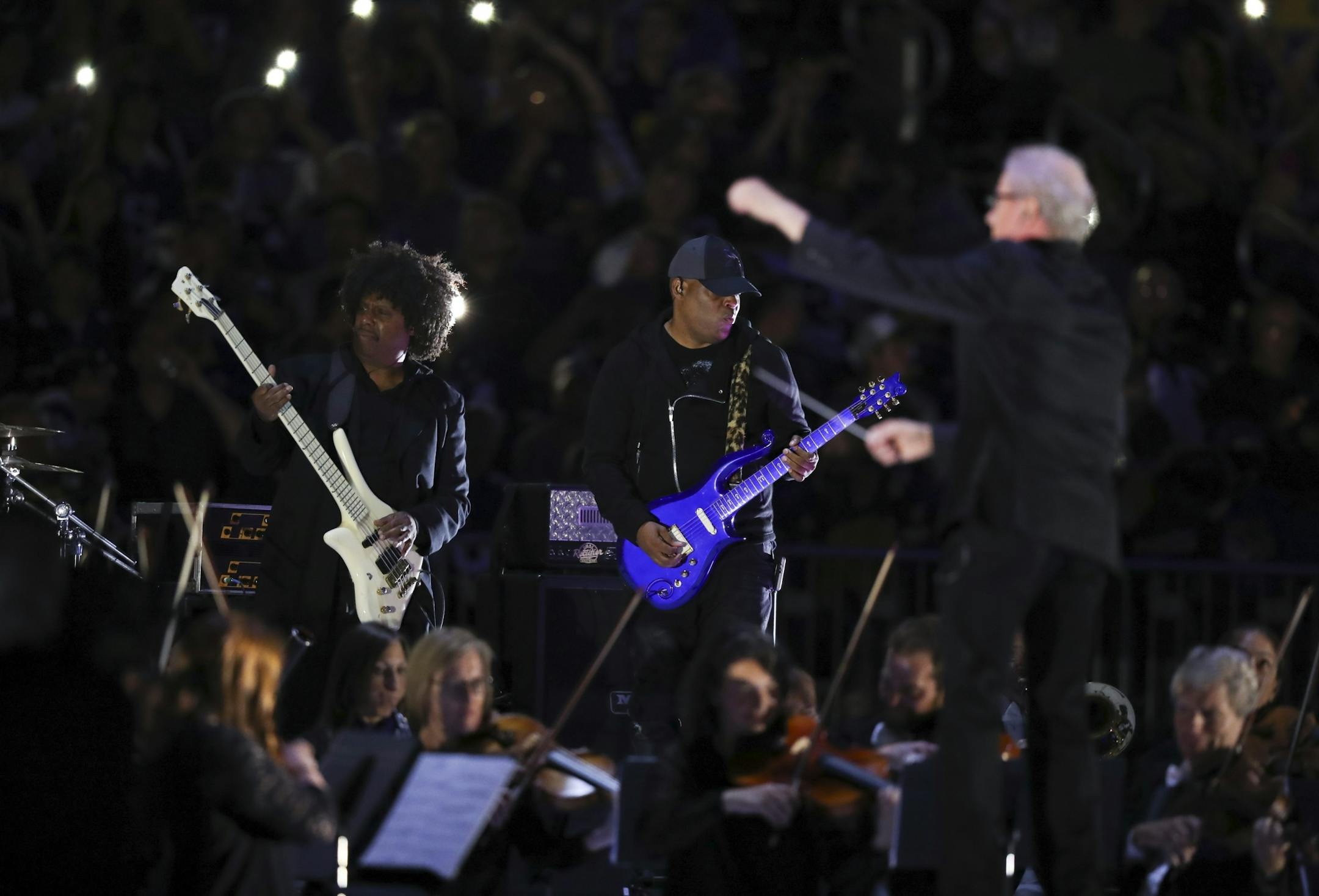 Members of Prince's group the New Power Generation joined the Minnesota Orchestra for a performance of Purple Rain at halftime.