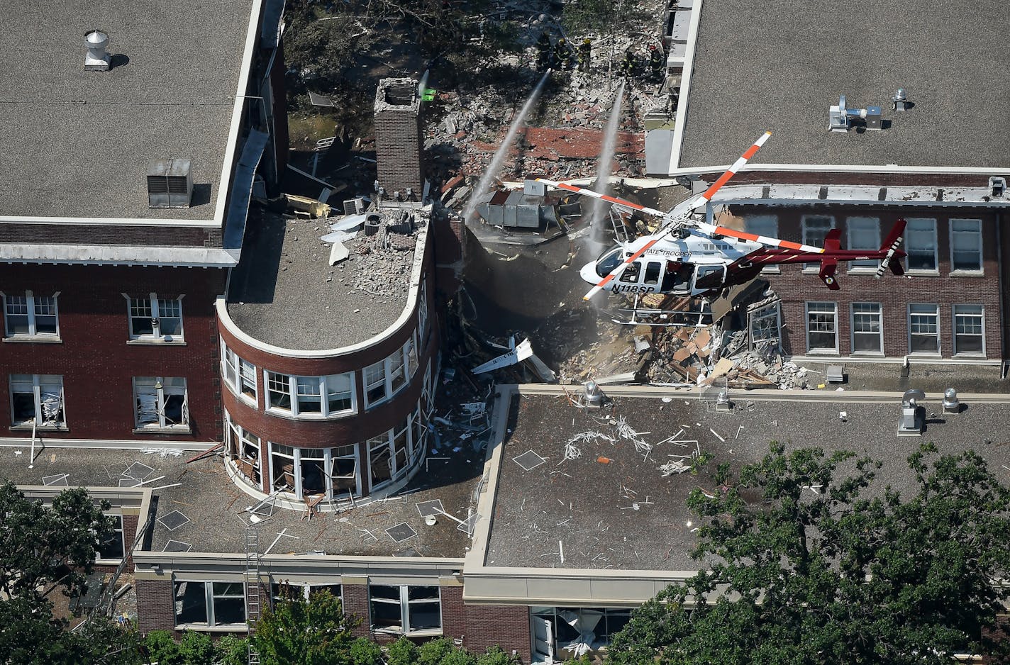 Emergency workers responded to the explosion at Minnehaha Academy Wednesday afternoon. ] AARON LAVINSKY &#xd4; aaron.lavinsky@startribune.com Aerial photos of explosion aftermath at Minnehaha Academy taken Wednesday, August 2, 2017 in Minneapolis, Minn. ORG XMIT: MIN1708021452408769