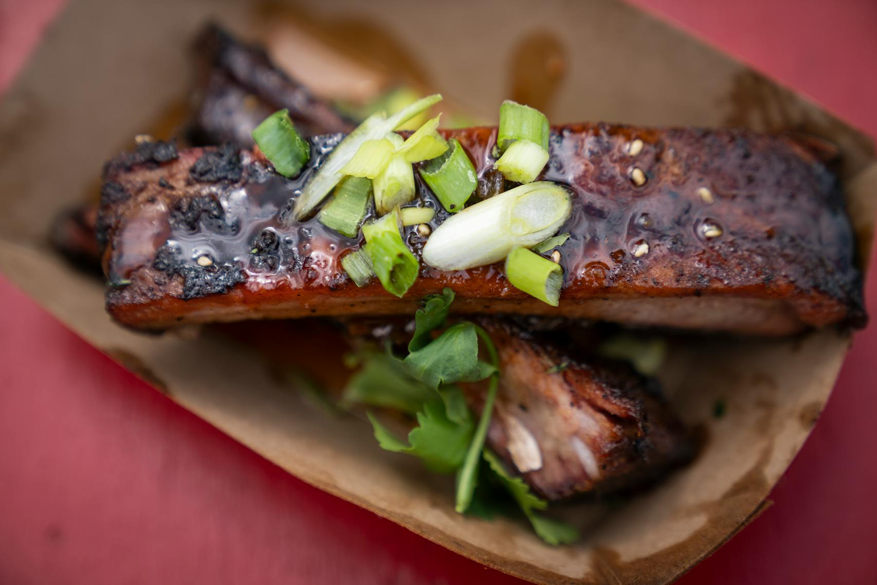 Maui-Sota Sticky Ribs from RC’s BBQ. The new foods of the 2023 Minnesota State Fair photographed on the first day of the fair in Falcon Heights, Minn. on Tuesday, Aug. 8, 2023. ] LEILA NAVIDI • leila.navidi@startribune.com