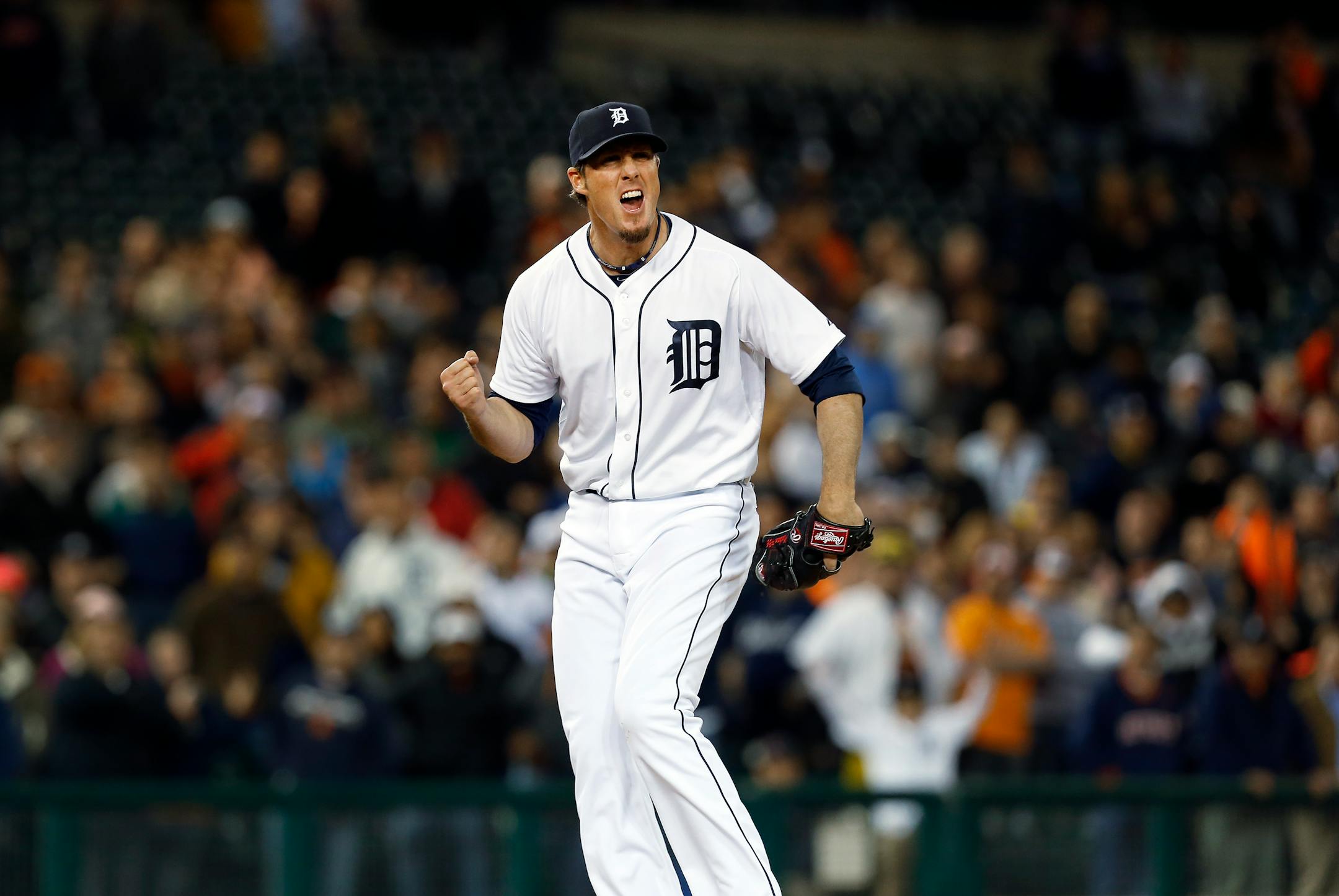Detroit Tigers relief pitcher Joe Nathan celebrates beating the Houston Astros 3-2 after the final out in the ninth inning of a baseball game in Detroit Wednesday, May 7, 2014. (AP Photo/Paul Sancya)