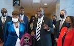 Civil rights attorney Ben Crump, who represented the George Floyd family, is joined by family members of victims of racial injustice following a meeti