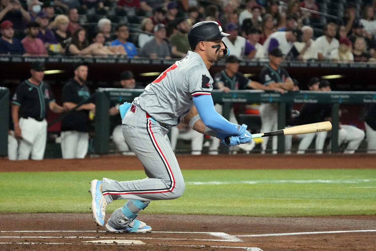 Twins third baseman Royce Lewis swings during a game at Arizona last week. Now he's on the injured list for the second time this season, a development