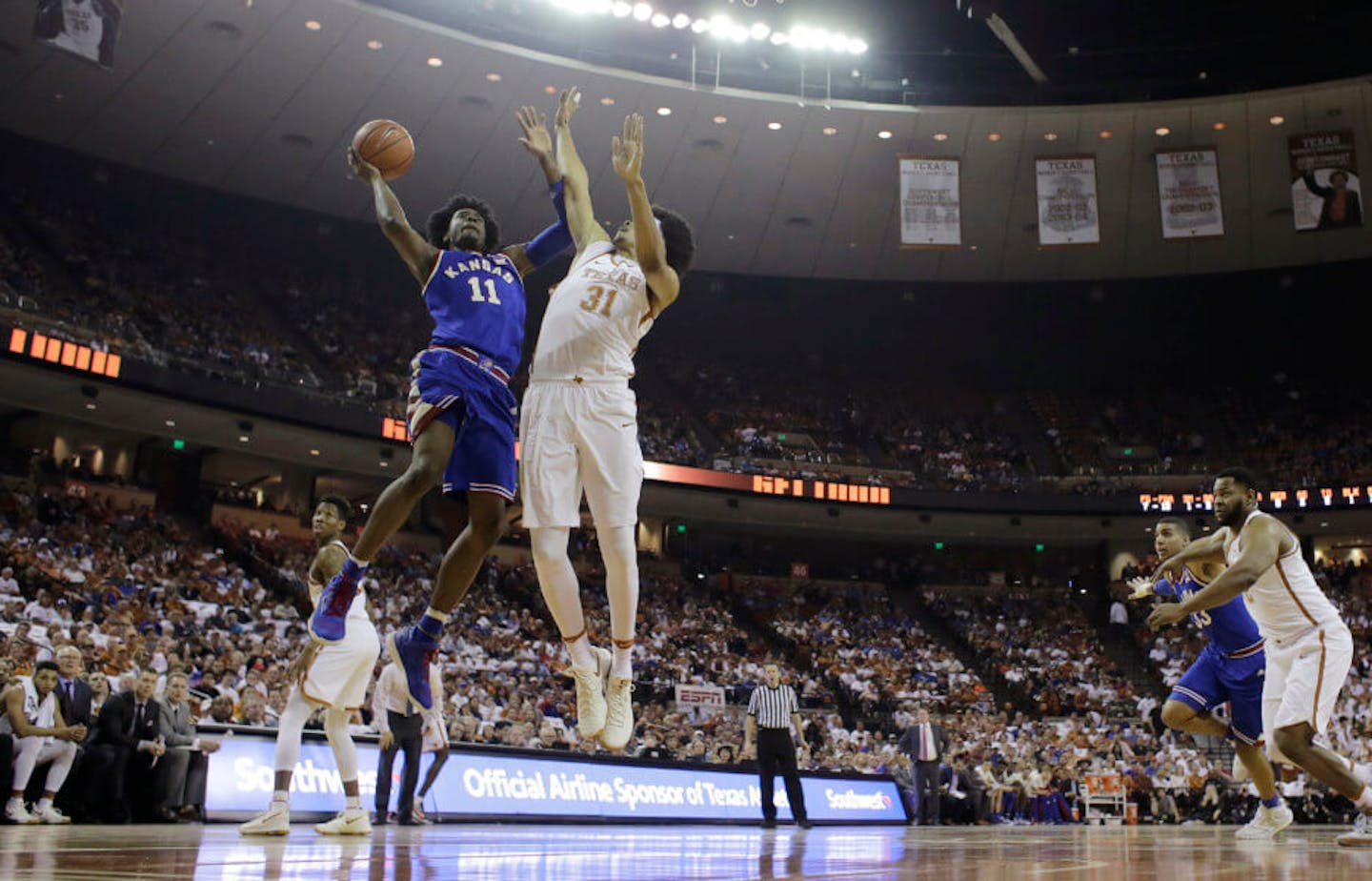 Jarrett Allen defends against Kansas guard Josh Jackson