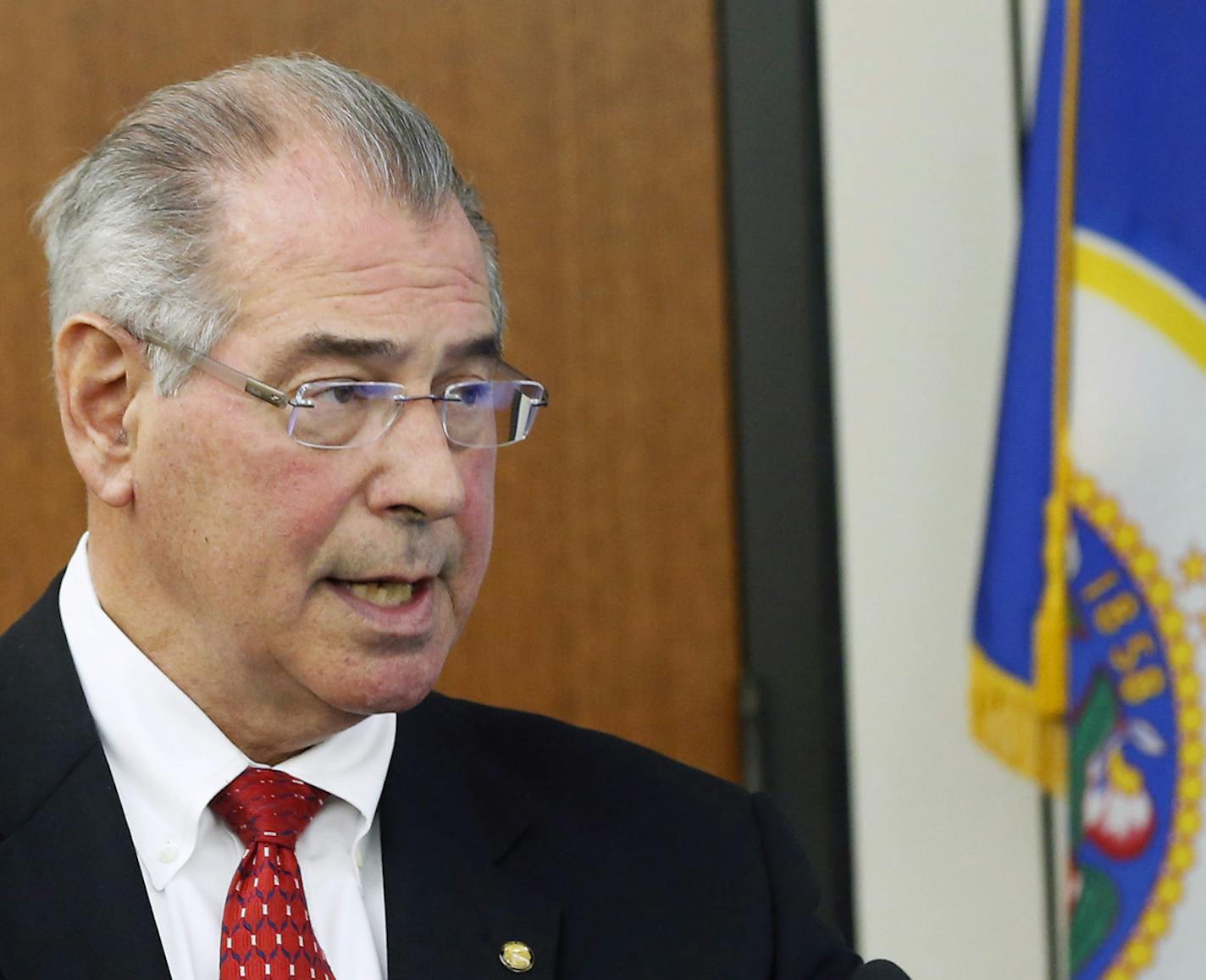 FILE - In this March 30, 2016, file photo, Hennepin County Attorney Mike Freeman speaks at a news conference in Minneapolis. Freeman has convened a grand jury in the July 2017 police shooting of Justine Ruszczyk Damond, of Australia, by Minneapolis Officer Mohamed Noor. Freeman said previously he would no longer use grand juries in police shootings, and would decide those cases himself. AP Photo/Jim Mone, File)