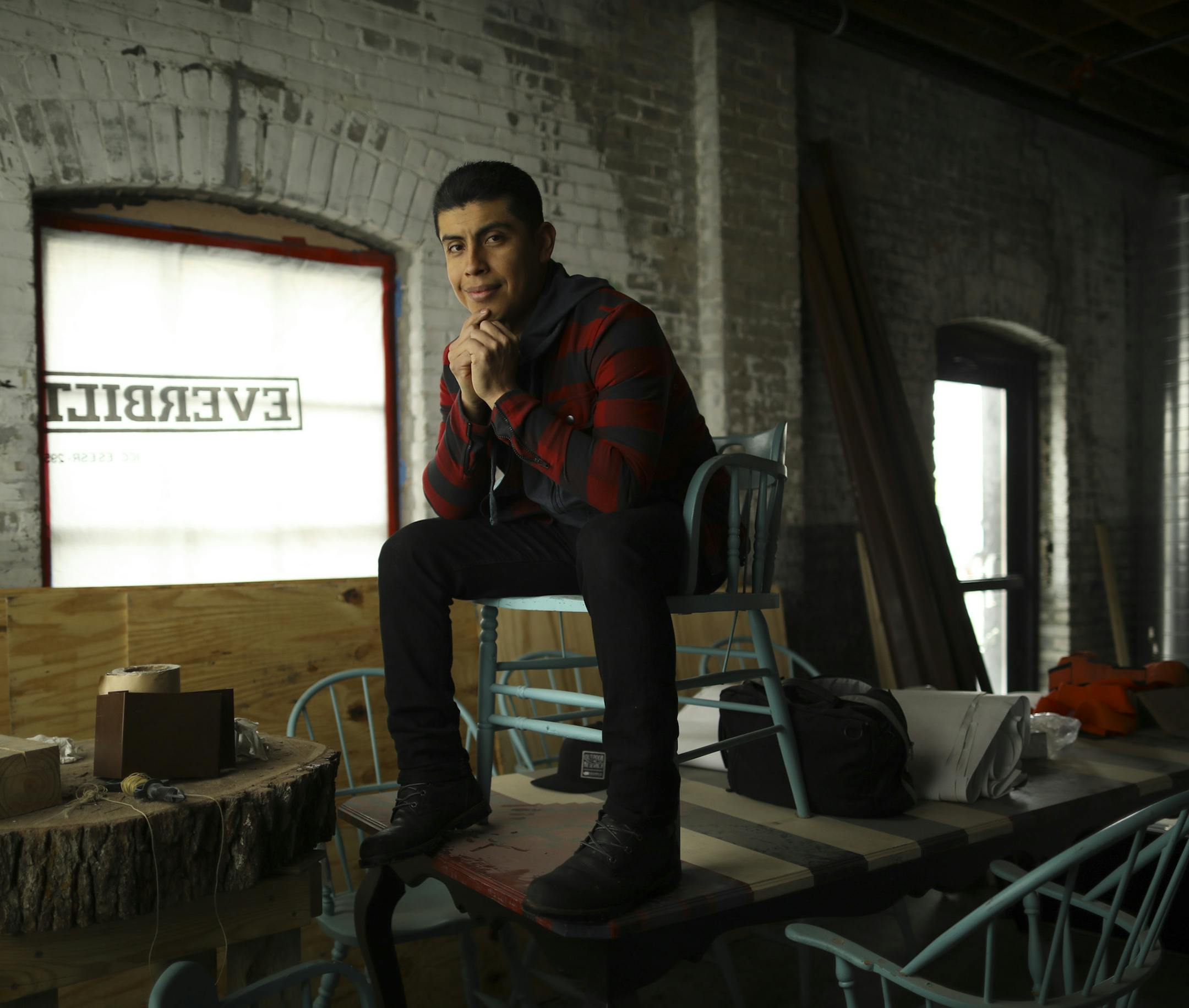 Chef Jose Alarcon in what will be the more formal of two dining rooms in his next project, Popol Vuh in Northeast Minneapolis. ] JEFF WHEELER ï jeff.wheeler@startribune.com Chef Jose Alarcon of Lyn 65 is readying a former industrial space along Quincy St. NE for his newest project, Popol Vuh, a showcase for Mexican street food. He was photographed in the space Tuesday afternoon, December 12, 2017.