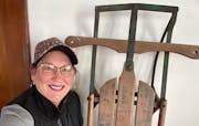 Connie Maertz Kasella with her brother’s sled, lost decades ago, likely at Town and Country Club.
