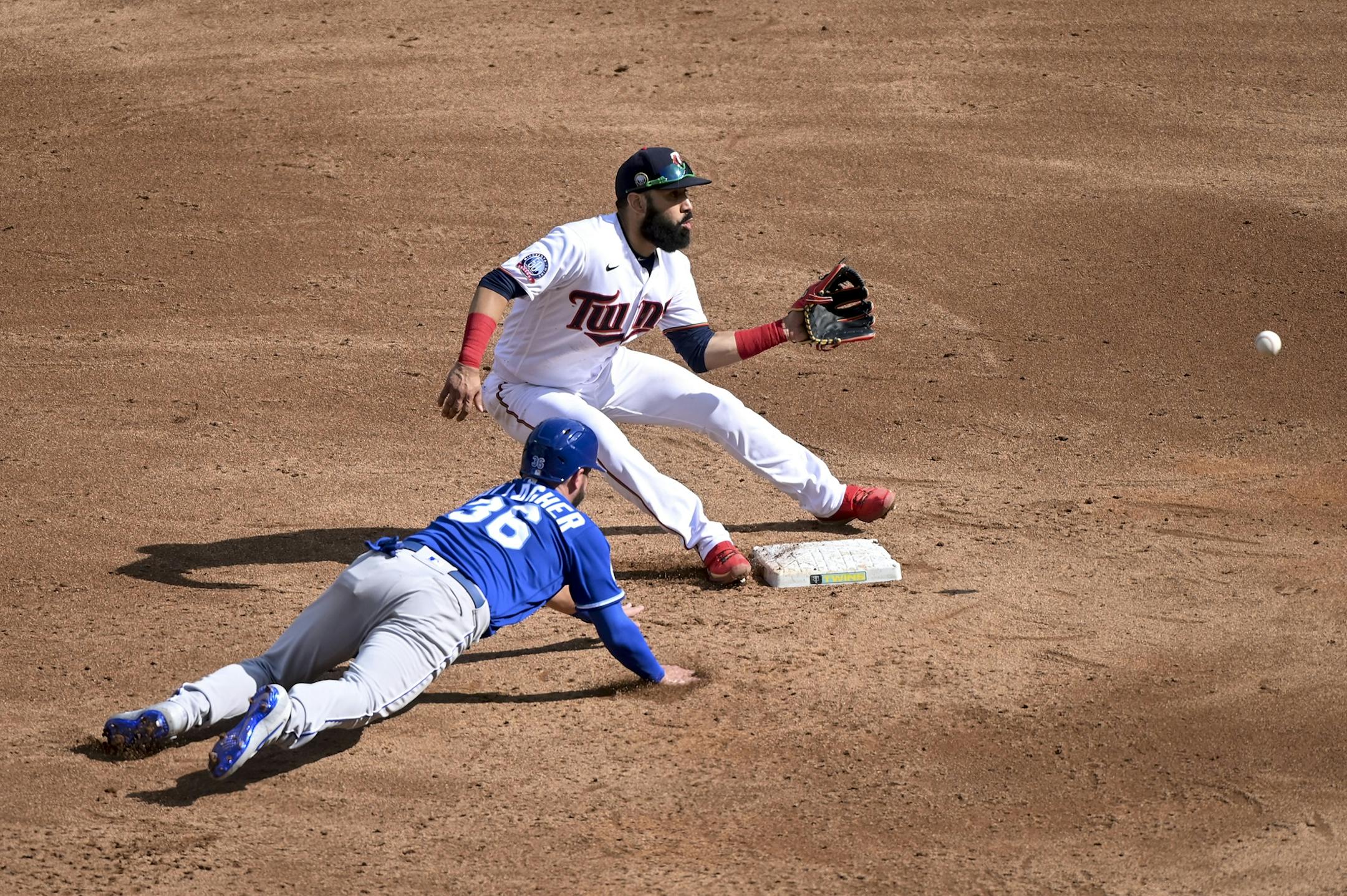 Minnesota Twins second baseman Marwin Gonzalez (9) picked off Kansas City Royals catcher Cam Gallagher (36) as he tagged back to second to end the top of the second inning.